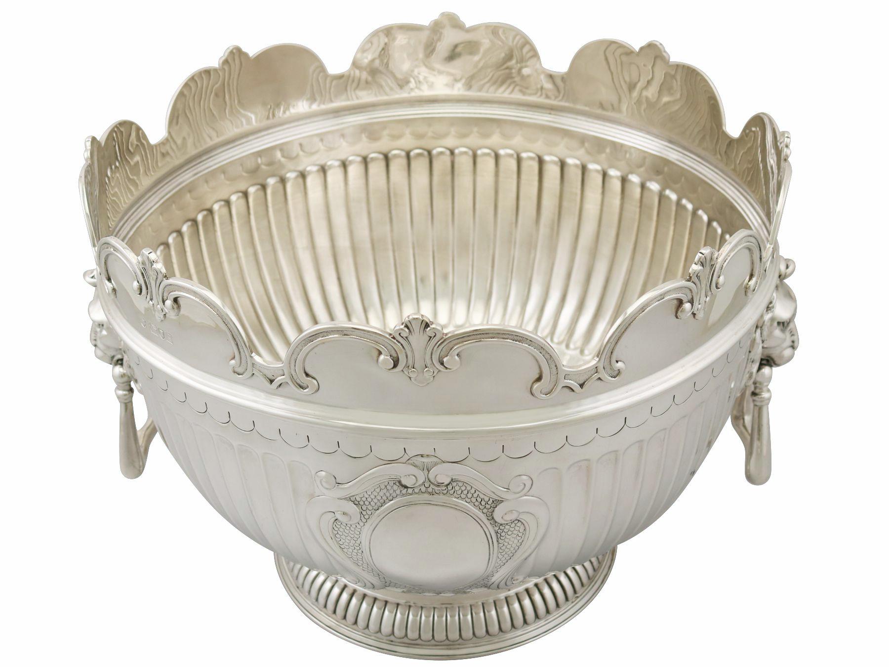 A magnificent, fine and impressive, large antique Edwardian English sterling silver Monteith style bowl; an addition to our range of collectable silverware

This magnificent antique Edwardian silver bowl, in sterling standard, has a Monteith form