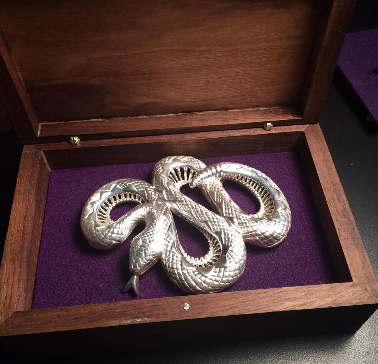 Large Sterling Silver Rattlesnake Belt Buckle by Ellie Thompson
Limited to an edition of just 25 buckles, each sterling silver buckle is signed and numbered. The snake is fully featured with open spoke work on the inside edges. Hinged loop holds up