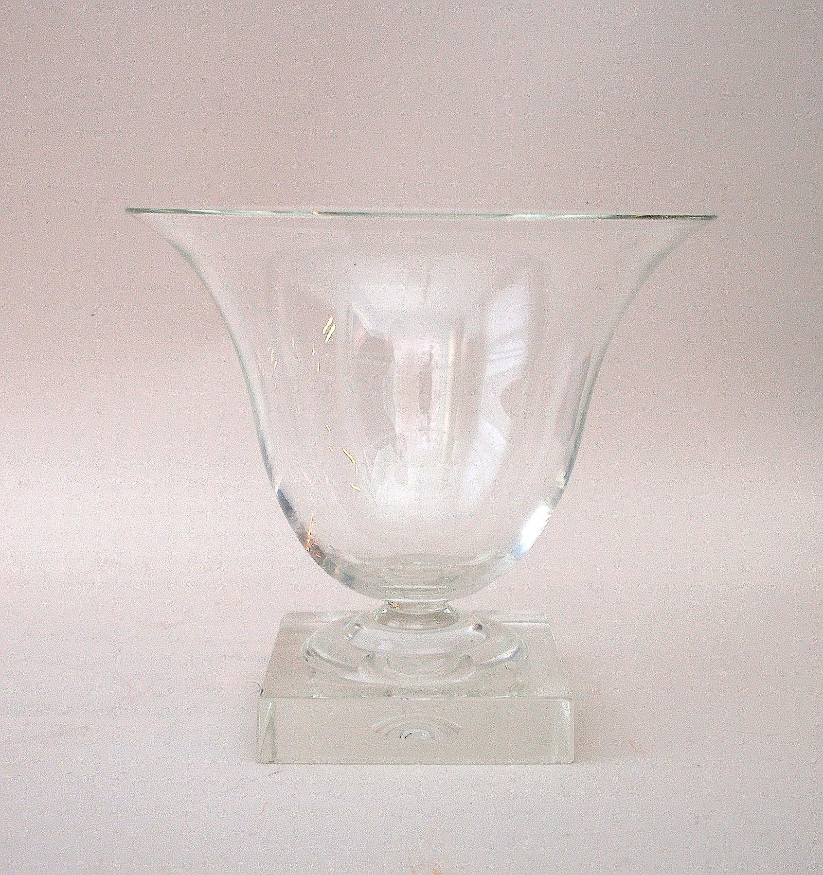 The simple but exquisite form of this urn, or vase, was derived from the ancient Greek mixing bowl, or krater. When Steuben Glass was revived and rebranded in the early 1930s, the urn was an early smash hit. Produced in different sizes, this one is