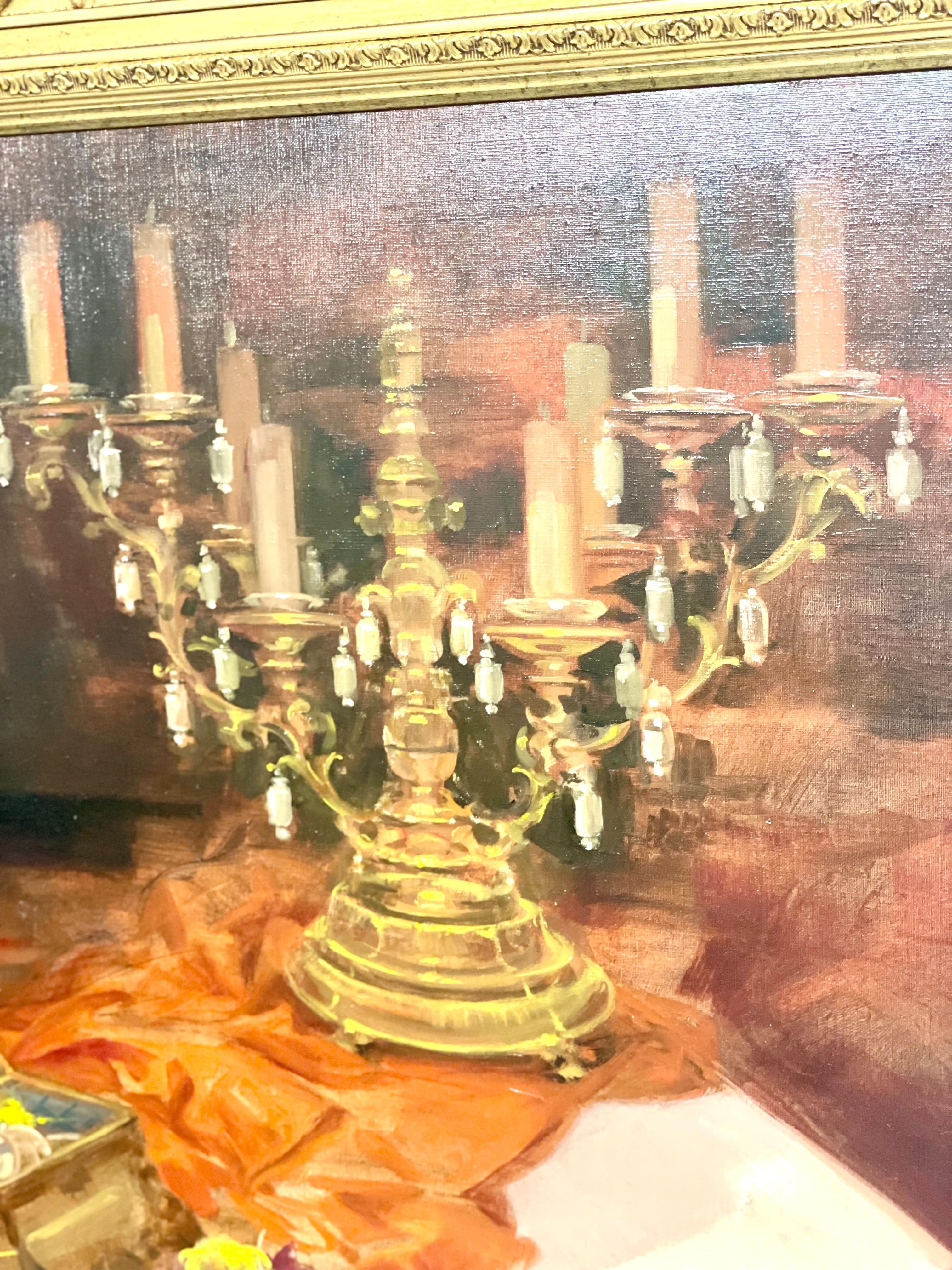 This impressive large-scale oil painting captures an opulent still life scene filled with elegance and refinement. A richly draped table is adorned with a profusion of blooming flowers arranged in a deep blue vase, their delicate petals rendered in