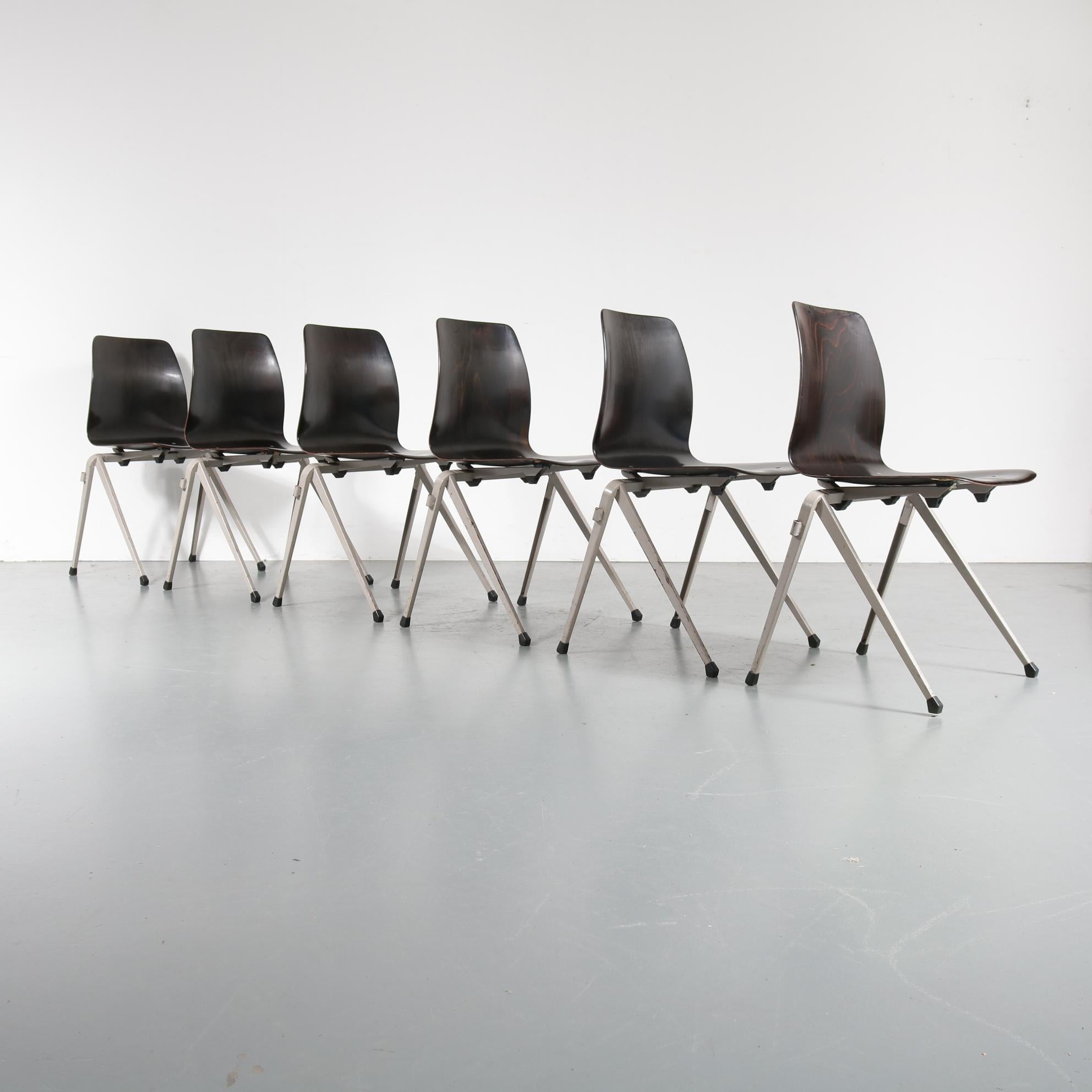 An impressive stock of 148 Industrial styled dining chairs, model S22, manufactured in The Netherlands by Galvanitas, circa 1970.

The chairs have eye-catching V-shaped legs and are linkable and stackable. This makes them perfectly suitable for