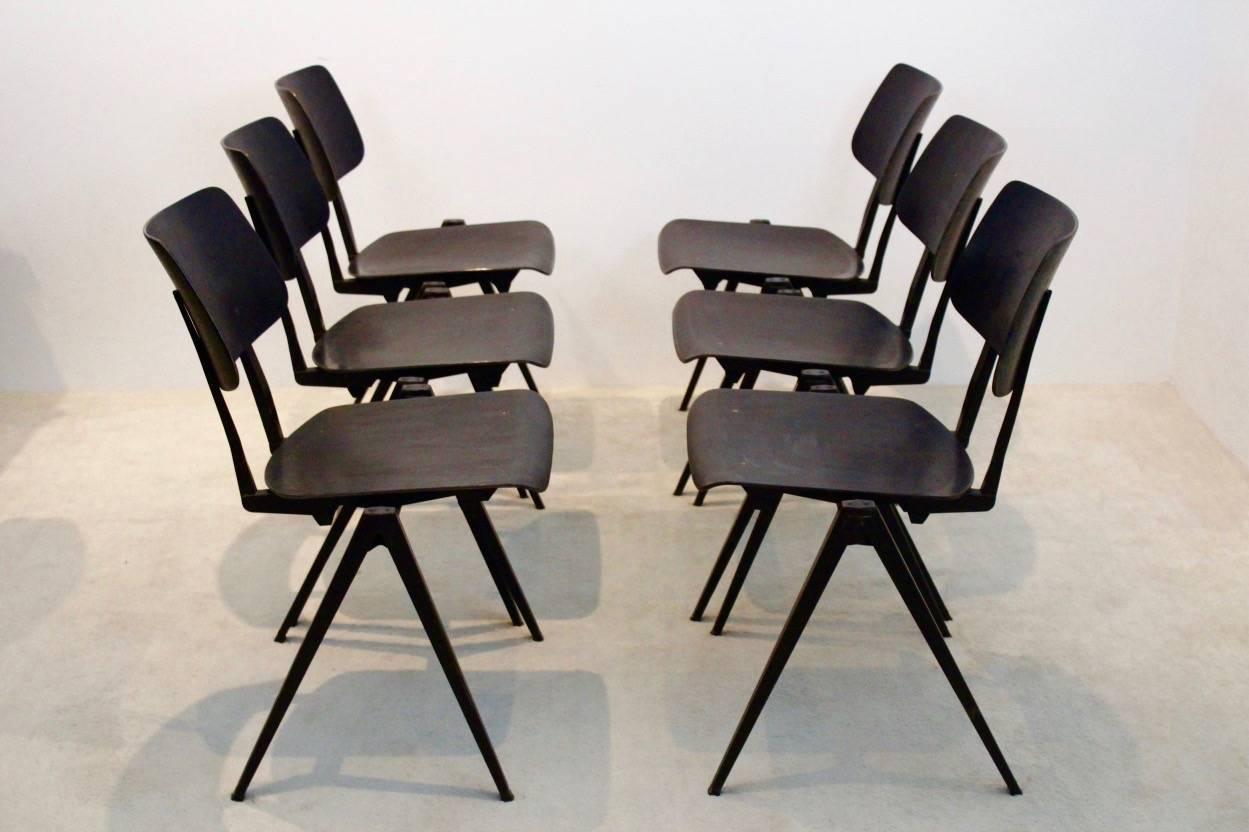 Highly wanted industrial S16 Pagwood stacking chairs by Galvanitas, designed in the manner of famous industrial designs by Wim Rietveld, Jean Prouvé and Friso Kramer (‘pyramid’ or ‘compass’ base principal ). These sculptural chairs are made for
