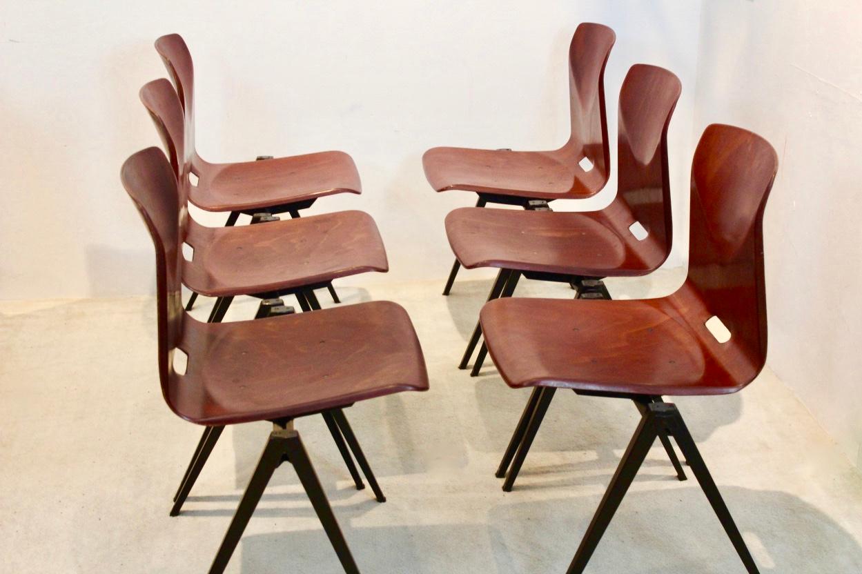 Highly wanted industrial model S22 stacking chairs by Pagholz. Galvanitas, in Brown frontside with Brown backside and with very dark brown frame. The shells have a beautiful wood grain structure.

Designed in the manner of famous Industrial