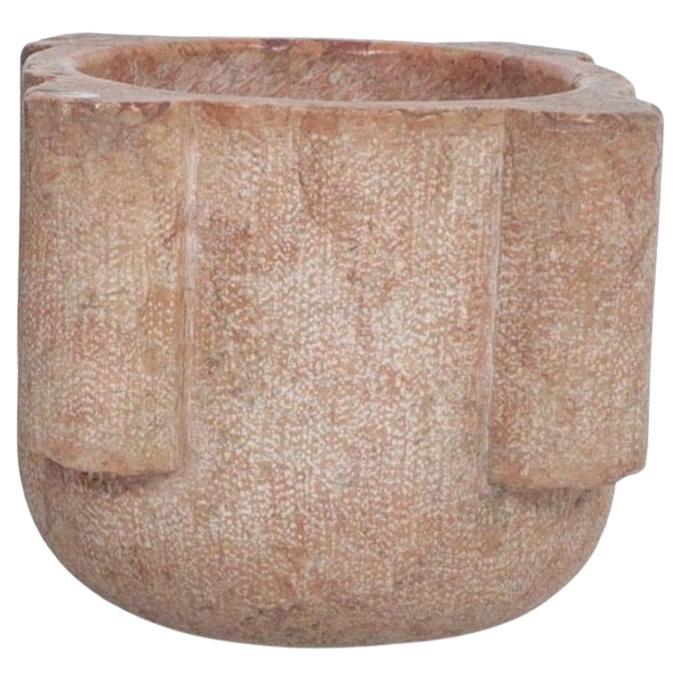 This very large and unique stone mortar from the 16th century has a beautiful and rare color palette. Earth tones accentuate the color layers of the marble. This piece has a great patina and character. It looks impressive set in a coffee table or