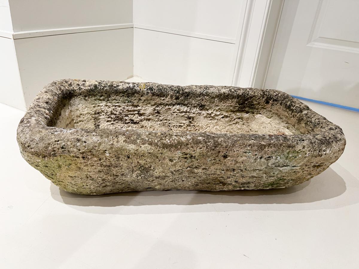 A rustic stone sink is a beautiful and functional addition to a home, bringing a natural and timeless appeal to bathrooms, kitchens, or outdoor spaces. This one is especially beautiful due to natural patina and pitting.