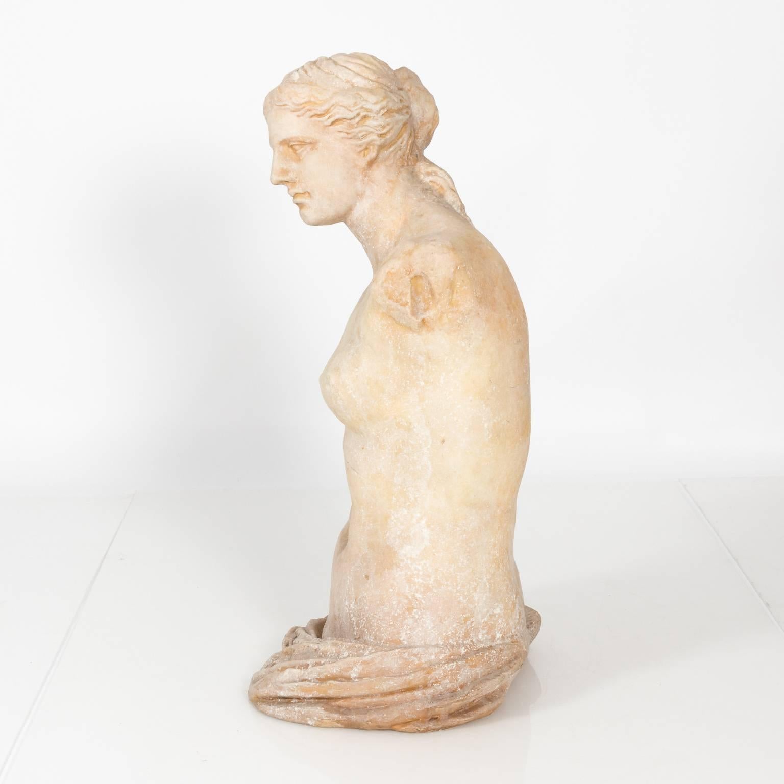Large stone and resin Venus de Milo decorative statue, circa 20th century.
