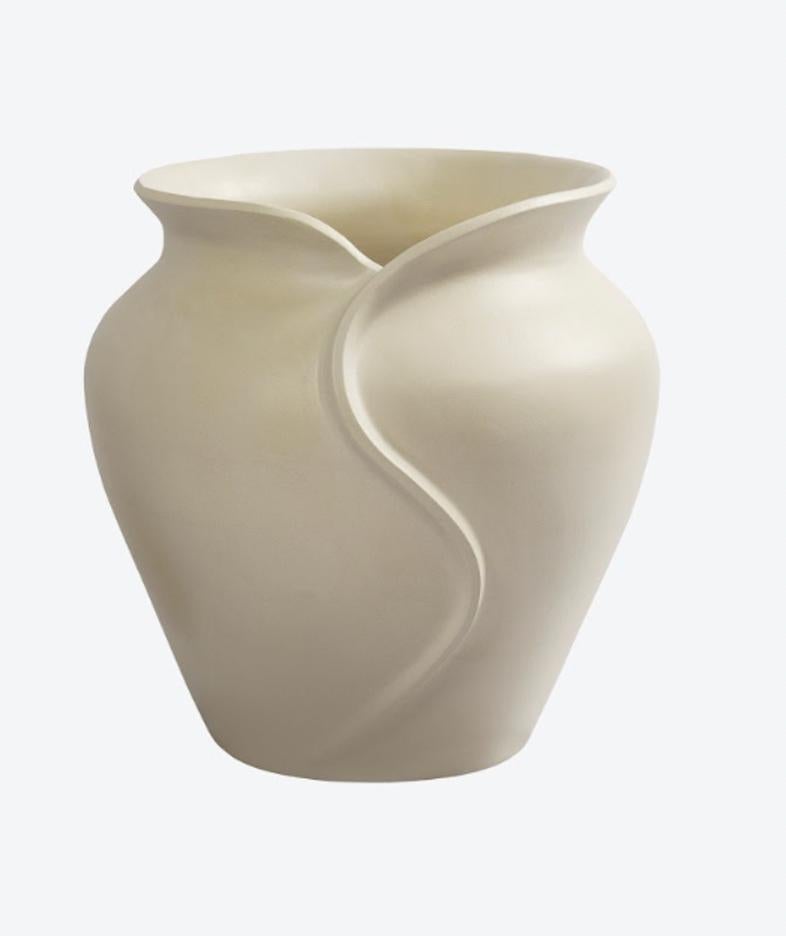 Our answer to the perfect planters. The Collar series, handmade from stoneware, are bold yet sensual in design. The large planter's massive scale and curves will make a statement in any room with beautiful plants or as stand-alone forms. 

Handmade