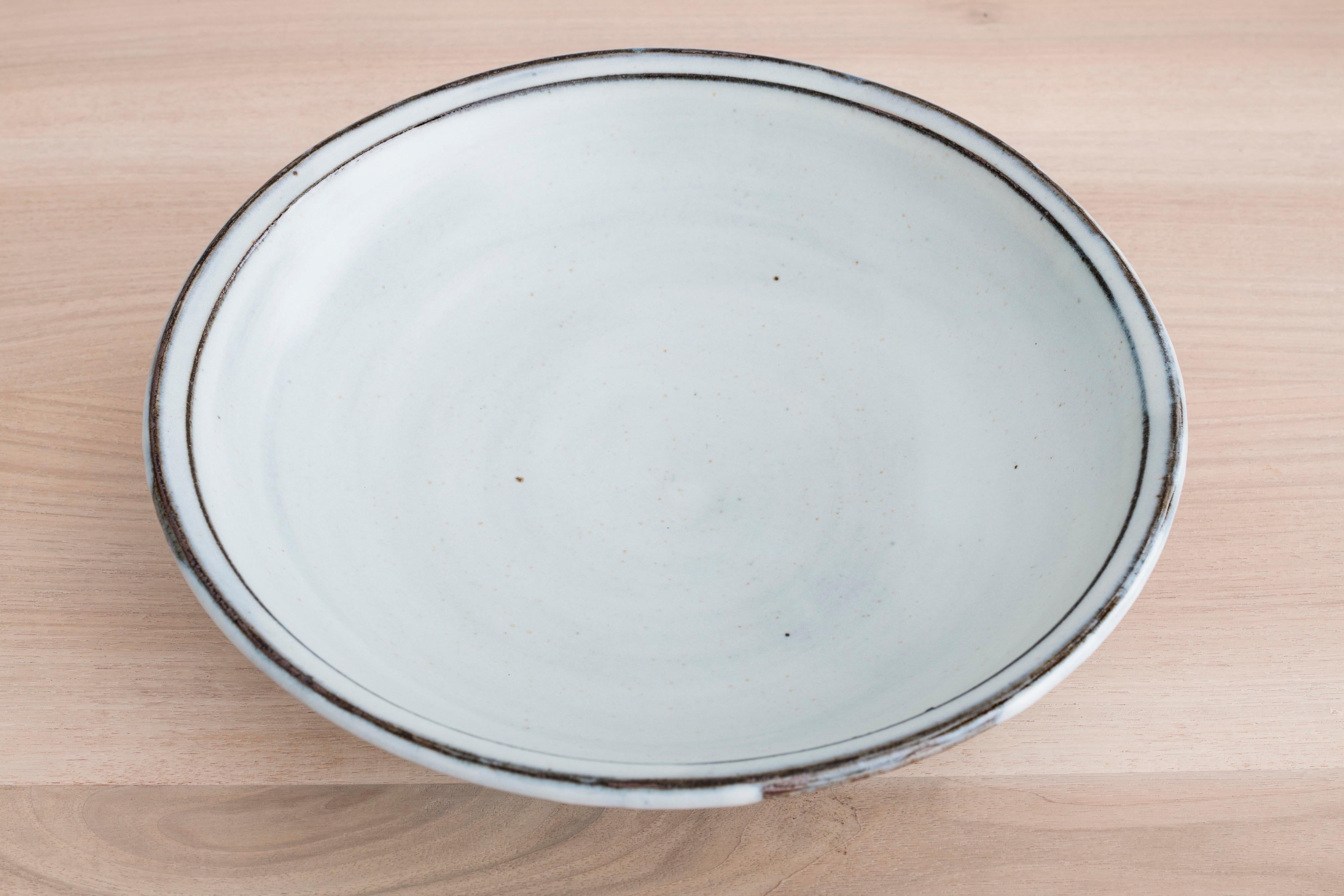 Handmade stoneware platter with Nuka glaze by Mats Svensson

Sweden, circa 2019.