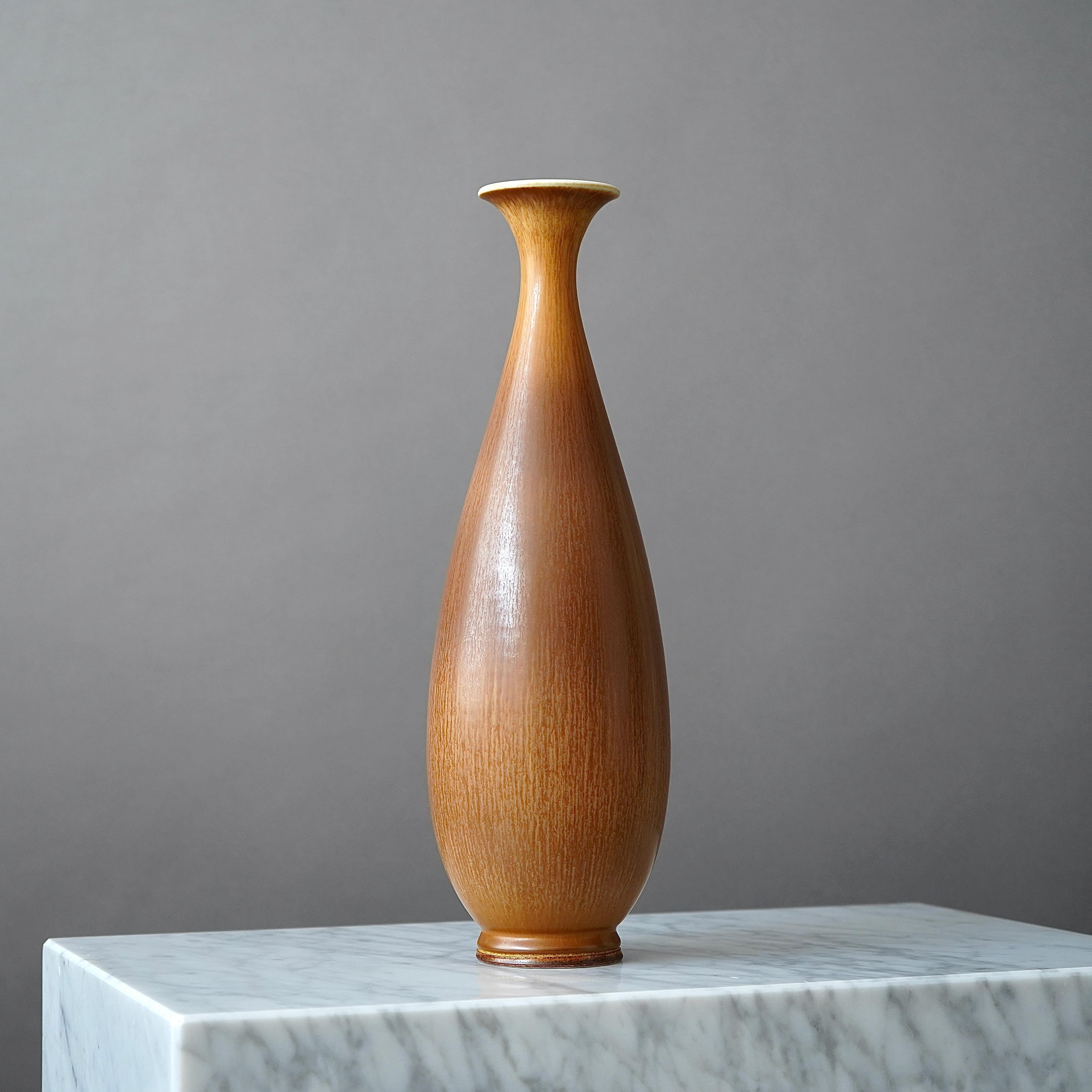 A large and beautiful stoneware vase with amazing hare’s fur glaze.
Made by master thrower Berndt Friberg, in the artist's studio at Gustavsberg, Sweden, 1964.

Excellent condition. 
Incised signature 