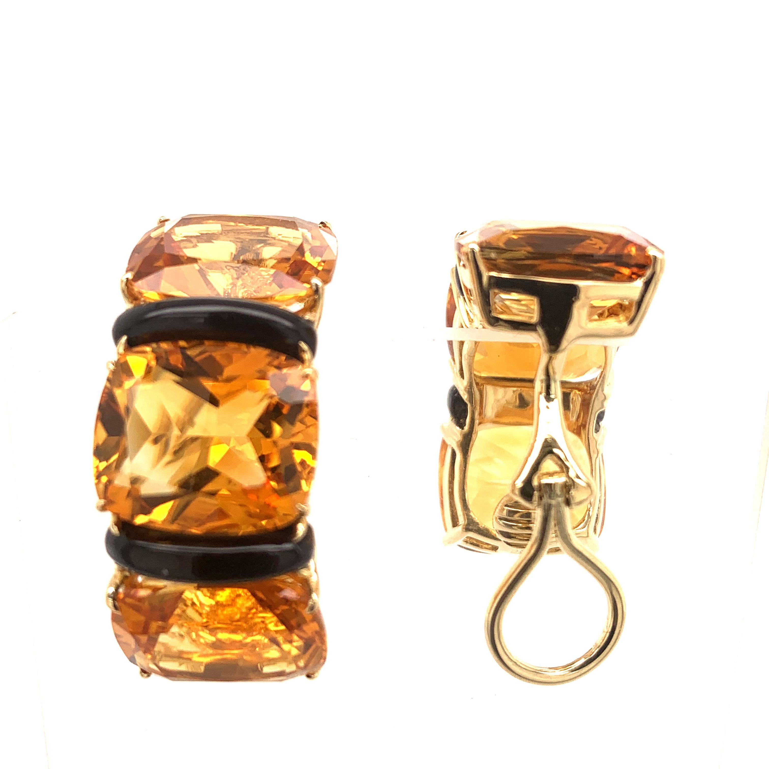 Dramatic, very chic  baguette hoop earclips.  Made, signed and numbered by SEAMAN SCHEPPS.  Three rows of large faceted citrines.  Rich luscious color, approximately 32 cts. Separated by two gleaming bands of onyx.  Omega clips.  1 1/3 