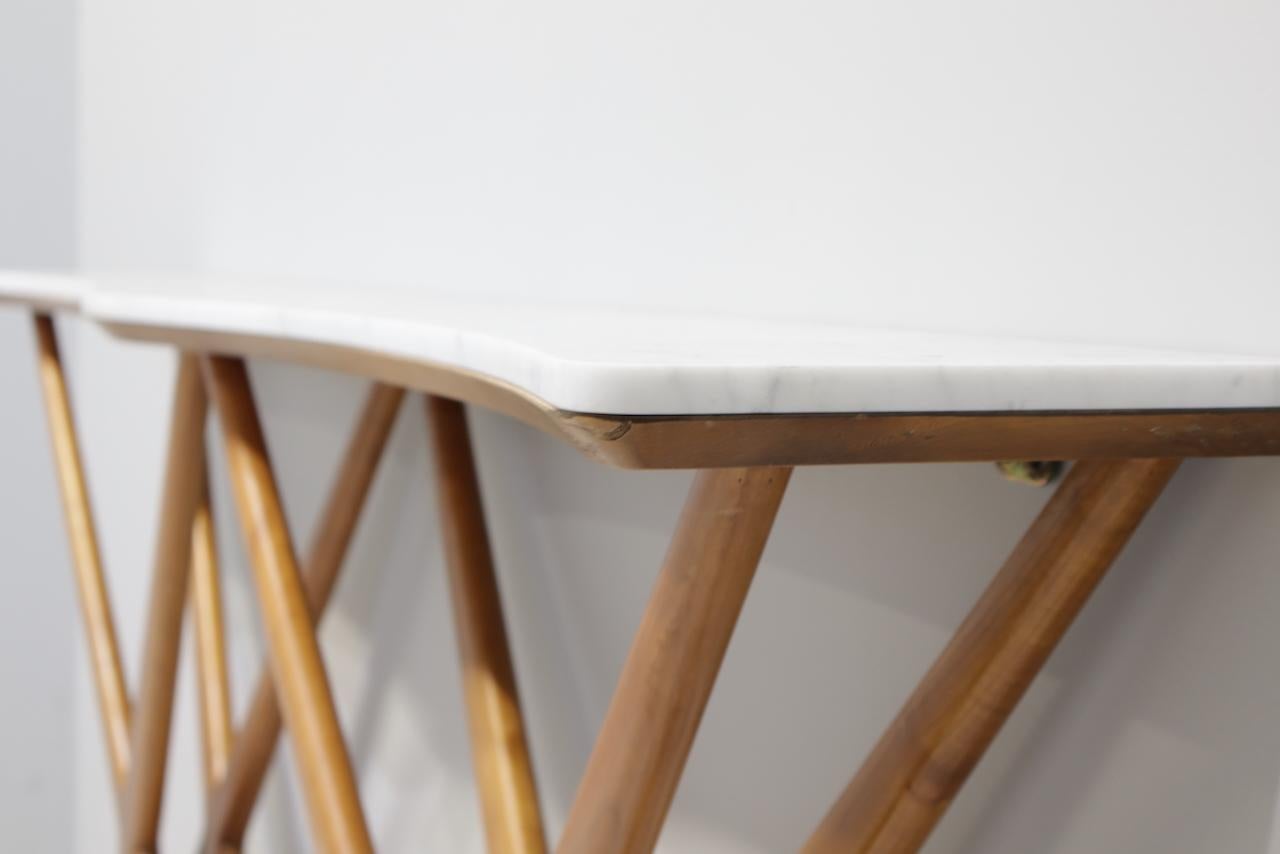 large and fine console  curved top in Carrara marble  designed by BBPR
Designed for the furniture of Belsana Office in Milan in Corso Matteotti,Milan 1944
Shape duble X
very good original condition
Biblio: THE ITALIAN FURNITURE OF THE 1940s...IRENE