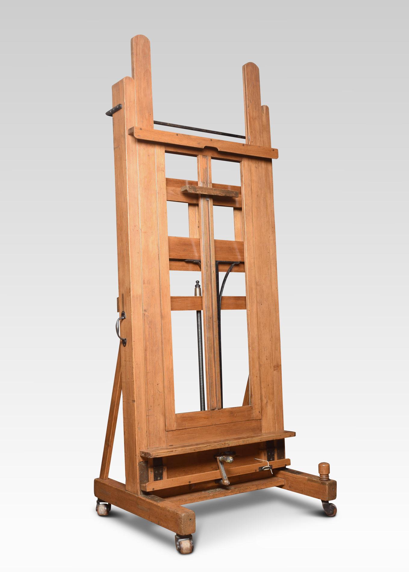 Large Windsor and Newton artist’s fully adjustable studio easel raised up on trestle base terminating in four lignum vitae casters.
Dimensions:
Height 96 inches when open 155 inches
Width 40.5 inches
Depth 31.5 inches.