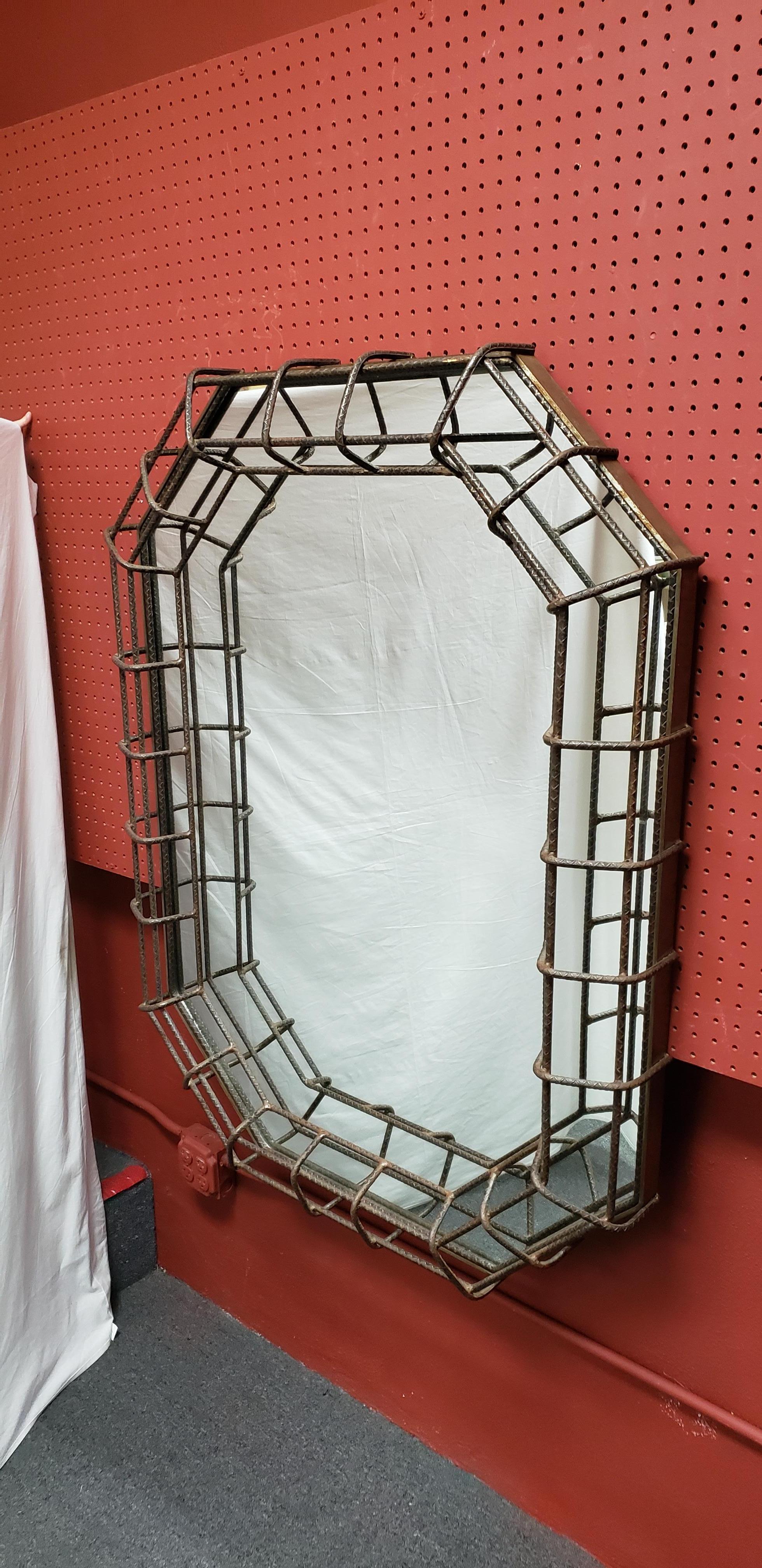 Large studio mirror in rebar, circa by an unknown artist, circa 1980s. Great worn patina!