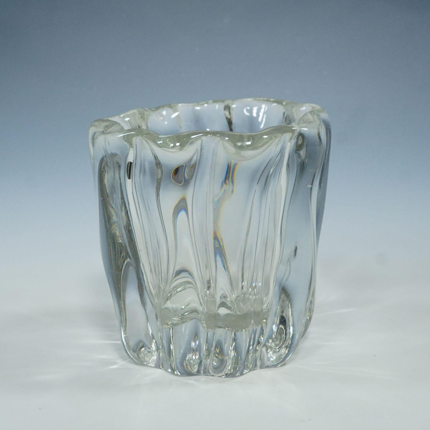 Large Stump of a Tree Art Glass Bowl by Tapio Wirkkala for Iittala 1951

A large 'Kalvolan kanto' (stump of a tree) bowl designed by Tapio Wirkkala for Iittala Glassworks in 1951. Mold blown crystal clear glass, marked with incised signature 'TAPIO