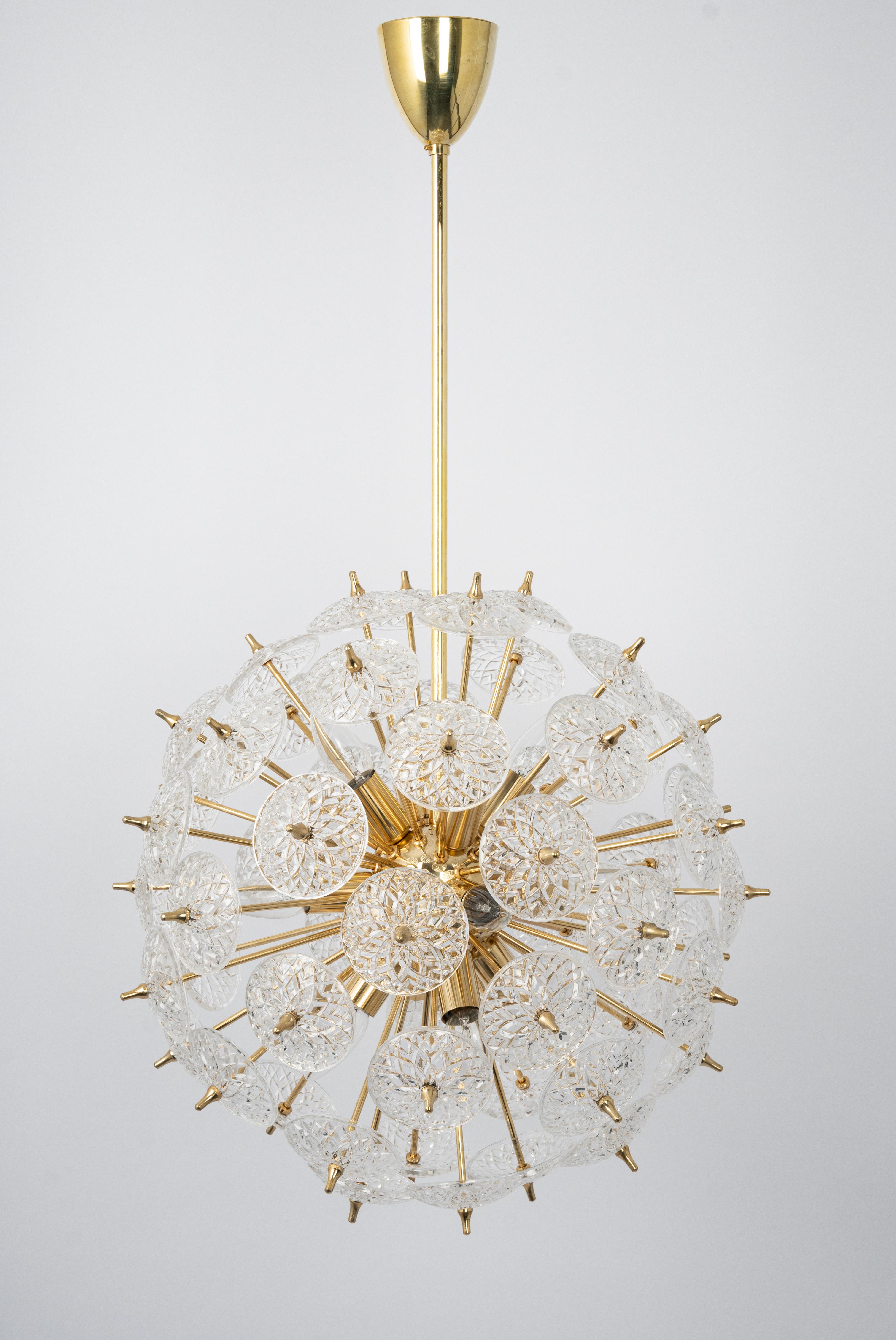 Stunning floral glass and brass Sputnik chandelier, Germany, 1970s.

Each Pendant light requires 12 x E14 small bulbs with 40W max each.
Light bulbs are not included. It is possible to install this fixture in all countries (US, UK, Europe, Asia,