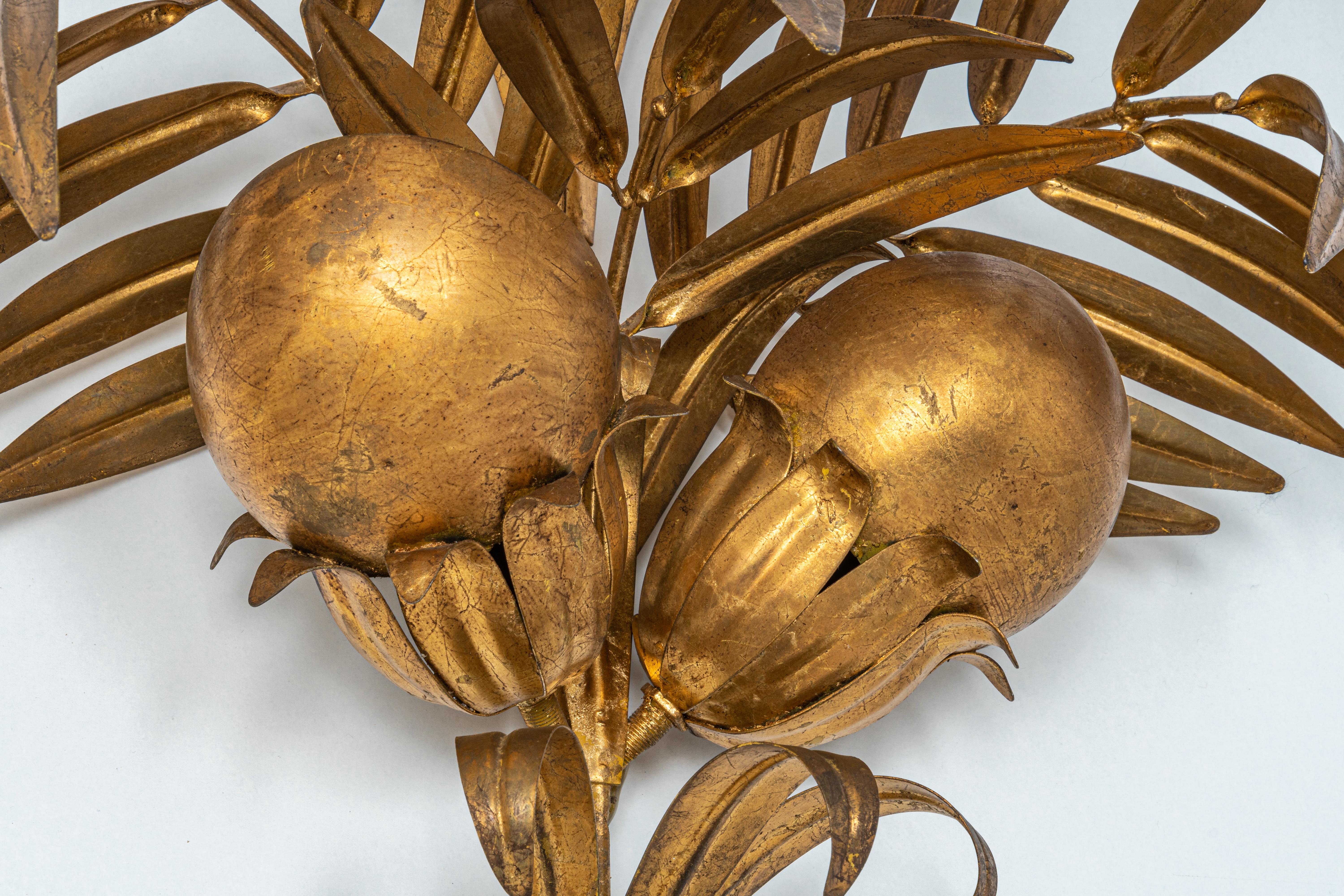 Large monumental Hans Kögl Pioggia D'oro wall sconce
Large gold-plated leaved branches 
By The Designer Hans Kogl
The sconce takes 2 single E14 bulbs, hidden behind each leaves,
circa 1970S


Very good condition. Cleaned, well-wired and ready