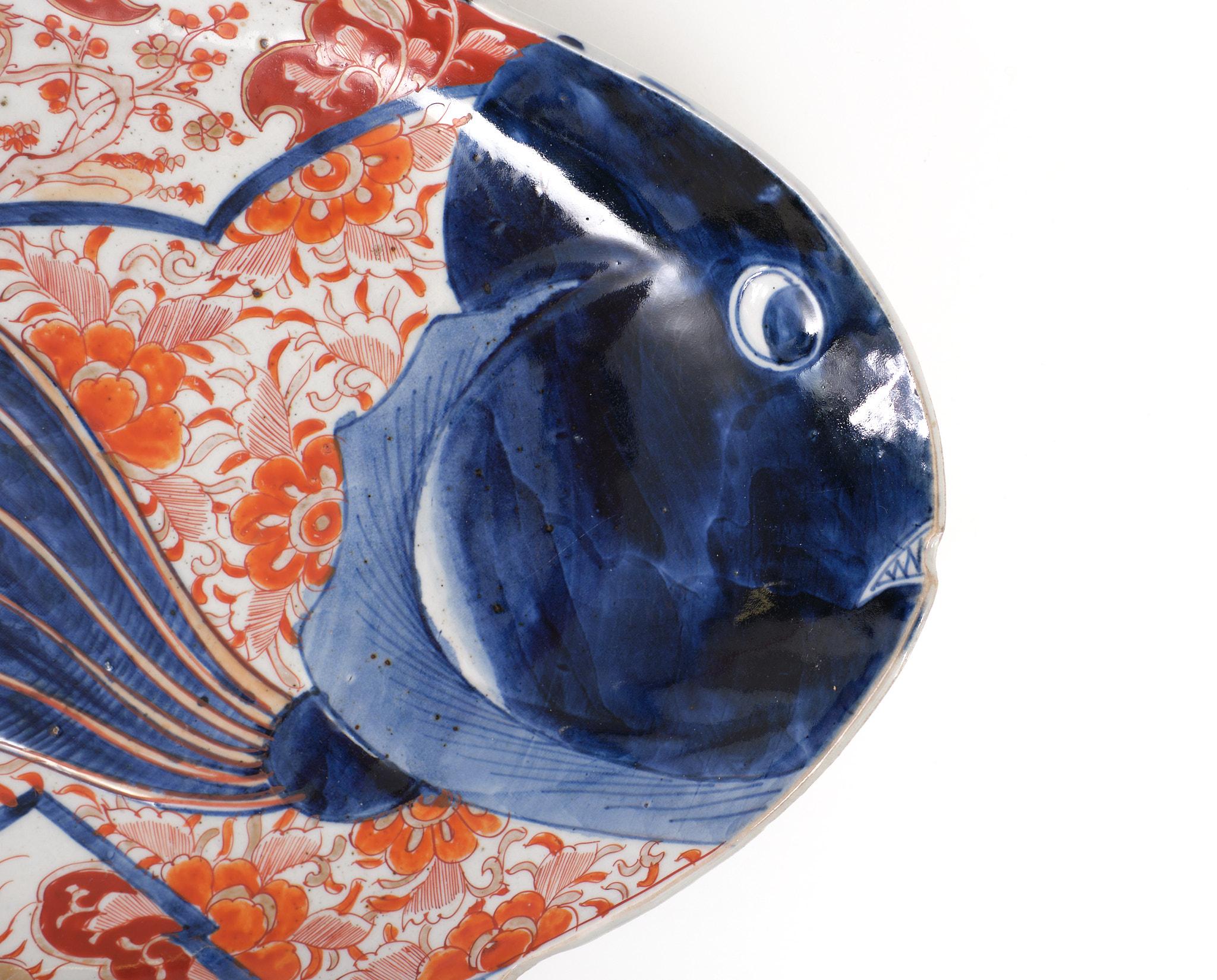 Makes me smile .when i see this Serving dish .The platter has been hand-painted and decorated with traditional Imari motifs. Meiji era (1868–1912) 
In rich shades of cobalt blue and iron red with gilt accents in places.
Great to serve your sushi on