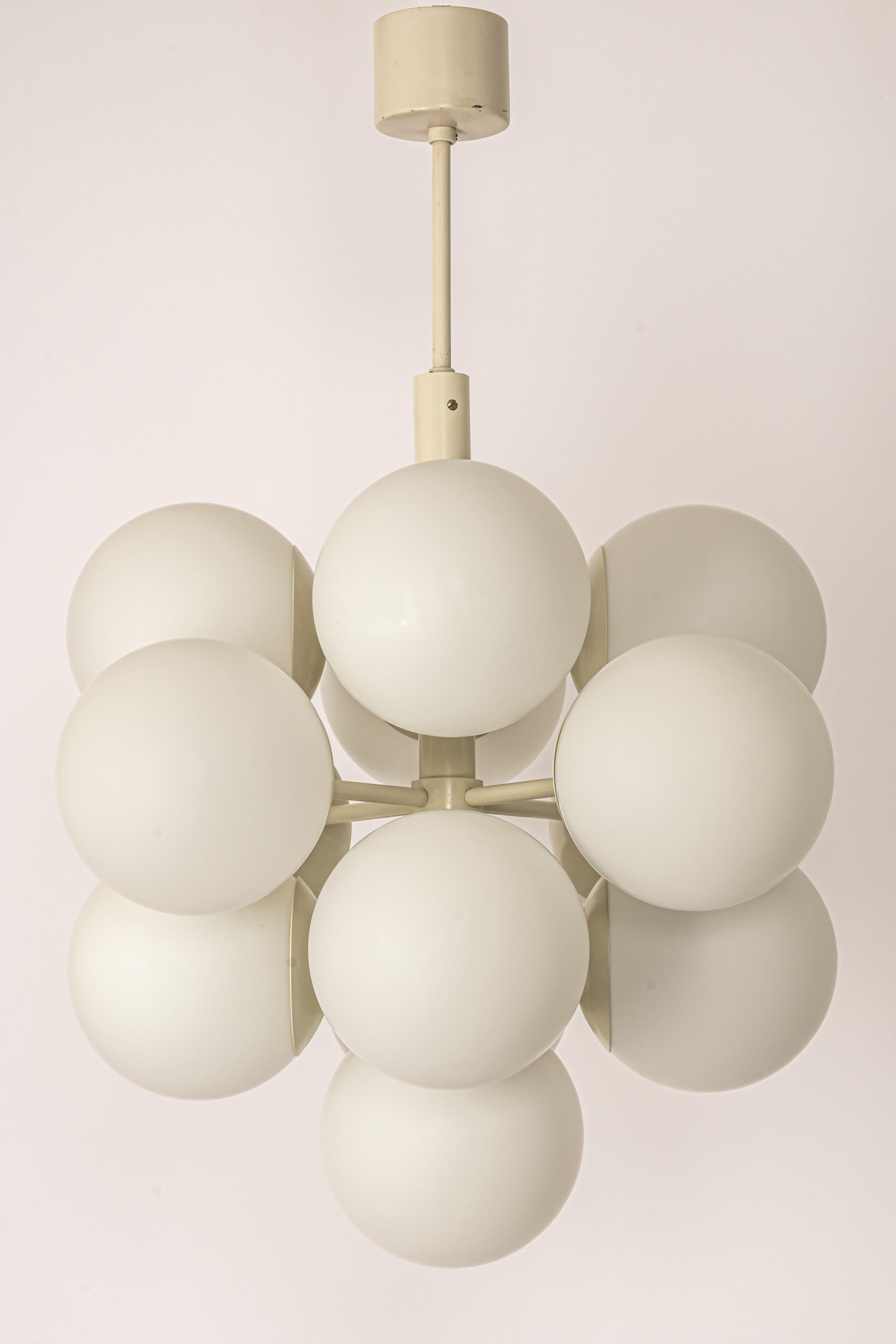 Stunning Sputnik chandelier with 13 handmade glass globes by Kaiser Leuchten, Germany, 1960s.

High quality and in very good condition. Cleaned, well-wired and ready to use. 

The fixture requires 13 x E14 small bulbs with 40W max each and