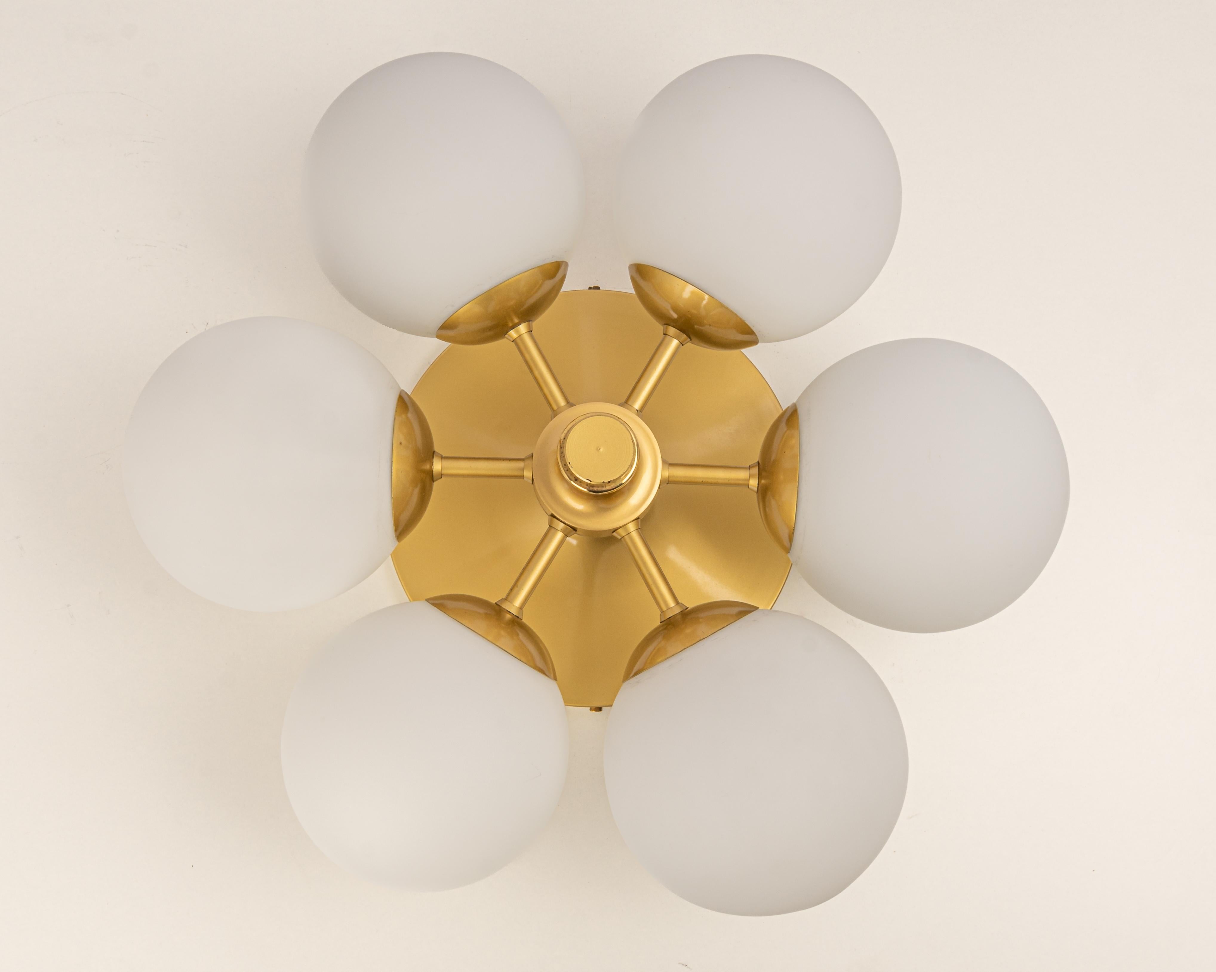 Stunning radial Sputnik brass color chandelier with six opal glass globes by Kaiser Leuchten, Germany, 1960s.

High quality and in very good condition. Cleaned, well-wired and ready to use. 

The fixture requires 6 x E14 standard bulbs with 40W