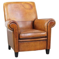 Large, sturdy, comfortable vintage cognac-colored sheepskin leather armchair