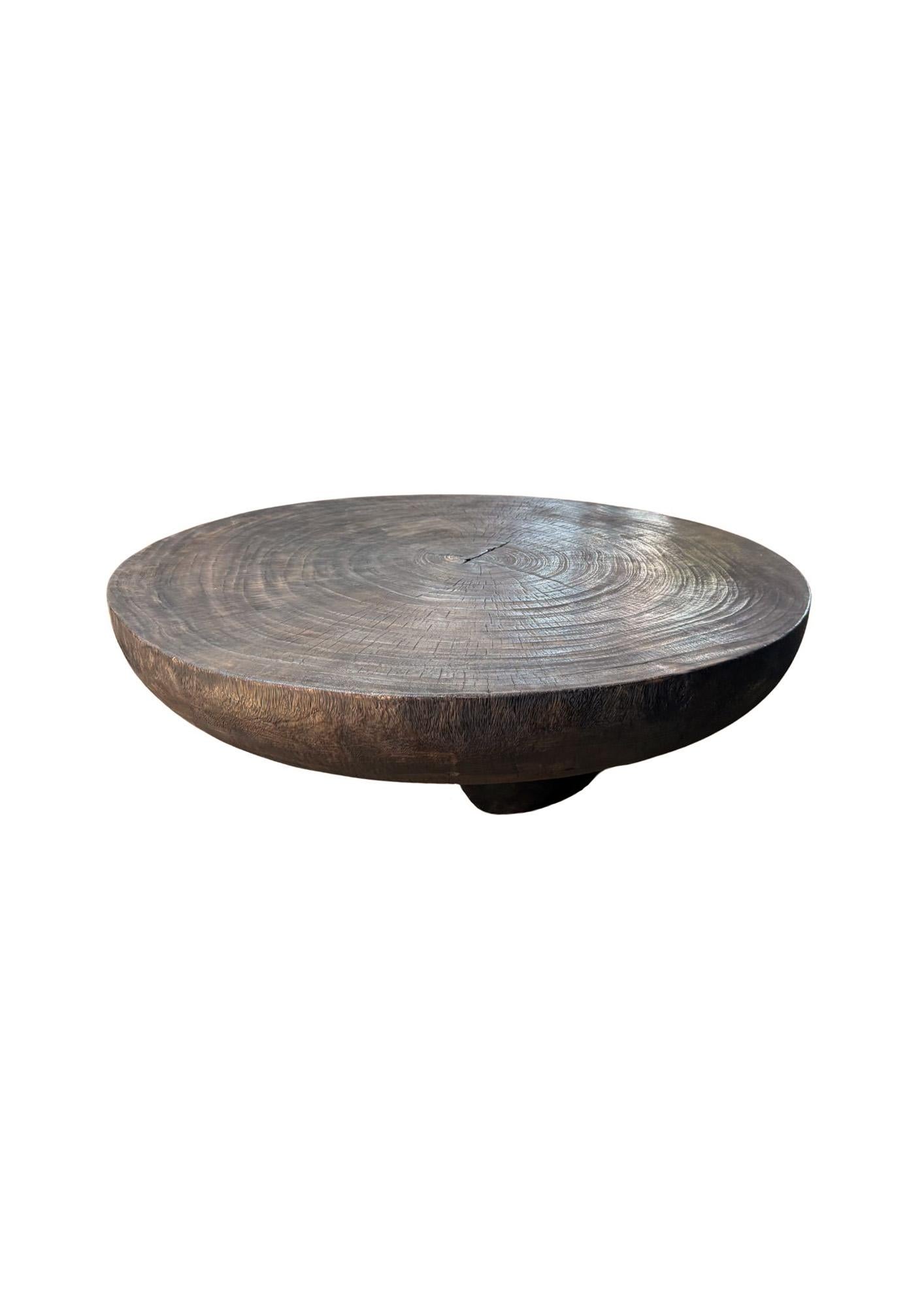 Make a bold, grounded statement with this Large Suar Wood Round Table, expertly handcrafted from solid Suar wood and finished in a richly layered 