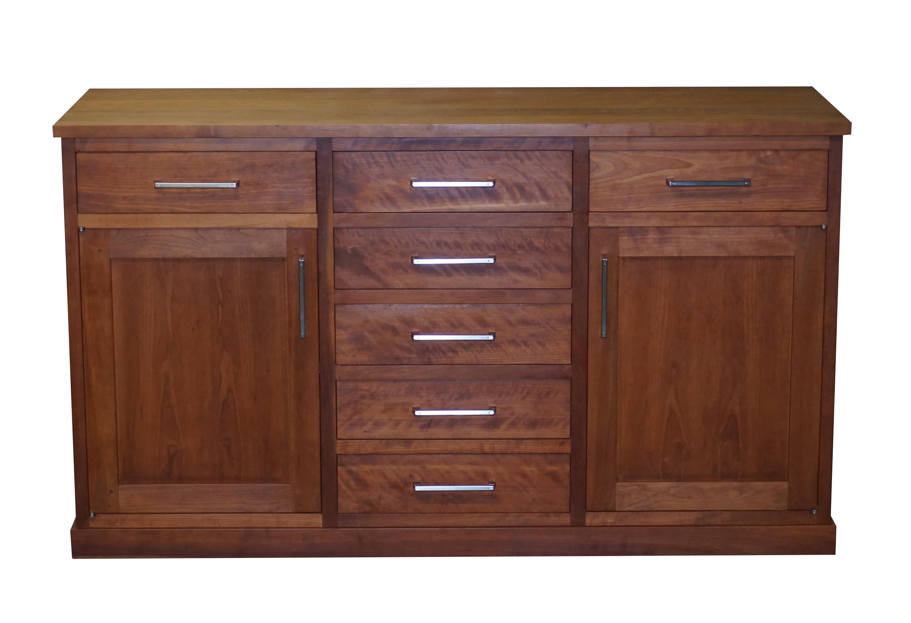 Wimbledon-Furniture is delighted to offer for sale this stunning hand made in Italy Riva 1920 solid American black Cherry wood sideboard with drawers

This is a very well made totally solid piece, it weighs a tonne, complete with two shelves and