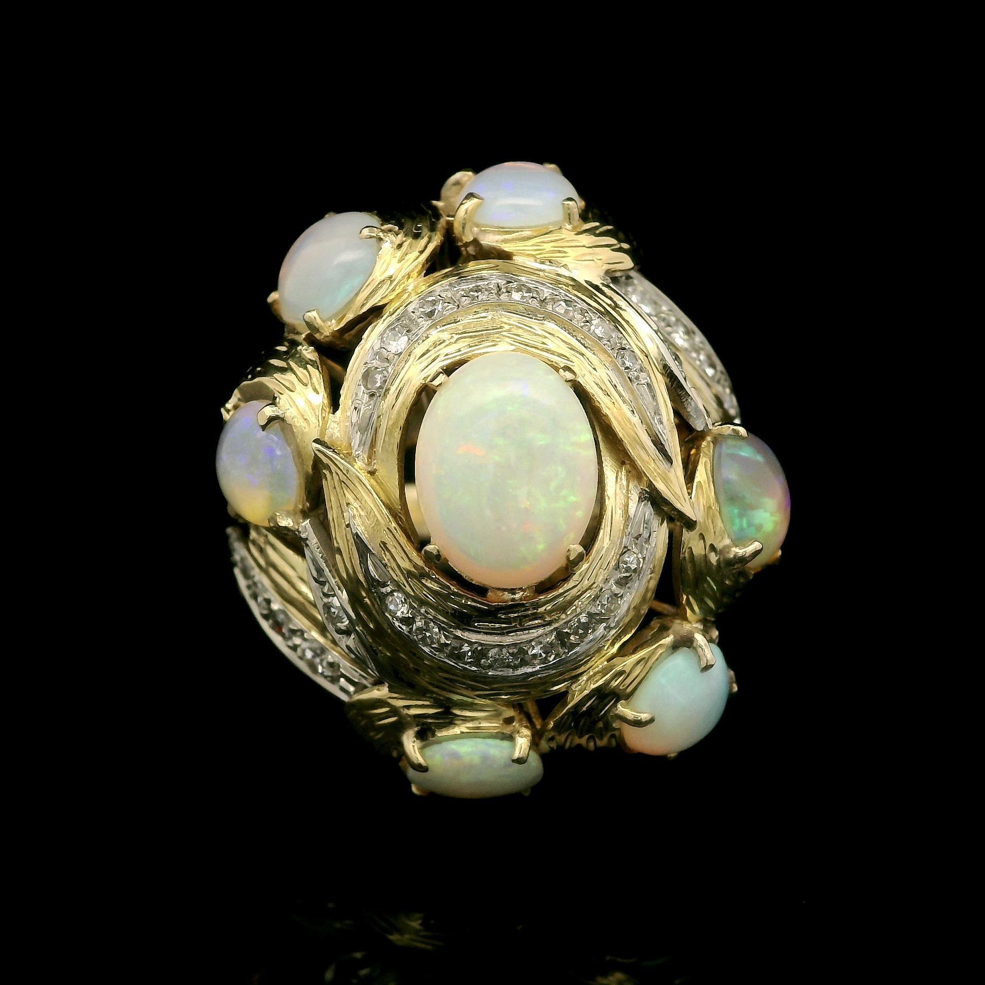 --Pierre(s) :...
(7) Opale véritable naturelle - 6 rondes taillées en cabochon et 1 ovale taillée en cabochon - sertie - couleur blanche avec un joli jeu de couleurs - 5,5-5,7 mm chacune (ronde, environ), 9,1x7 mm (ovale) (environ)
(29) Diamants