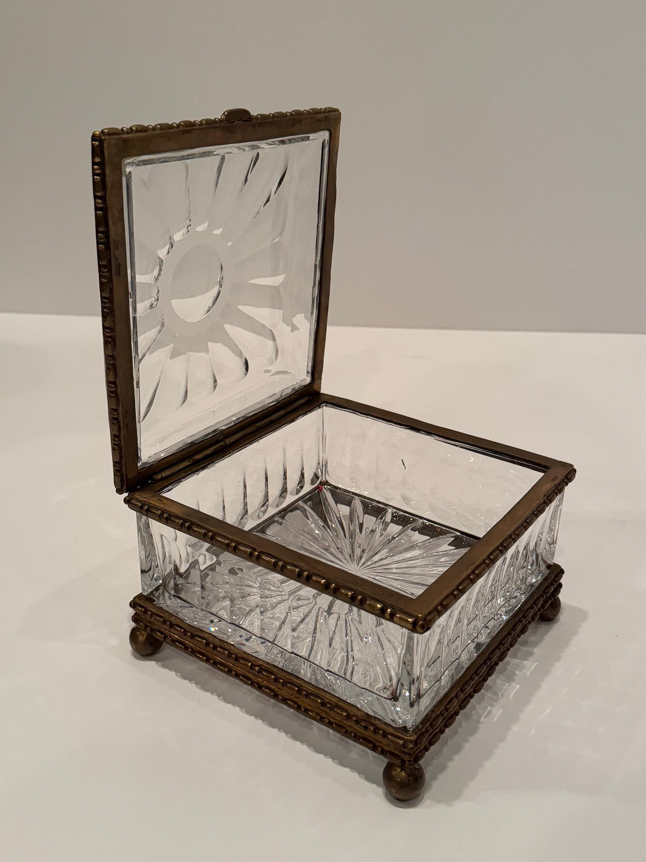 Superbly elegant large cut crystal box in the style of Baccarat having brass mounts.