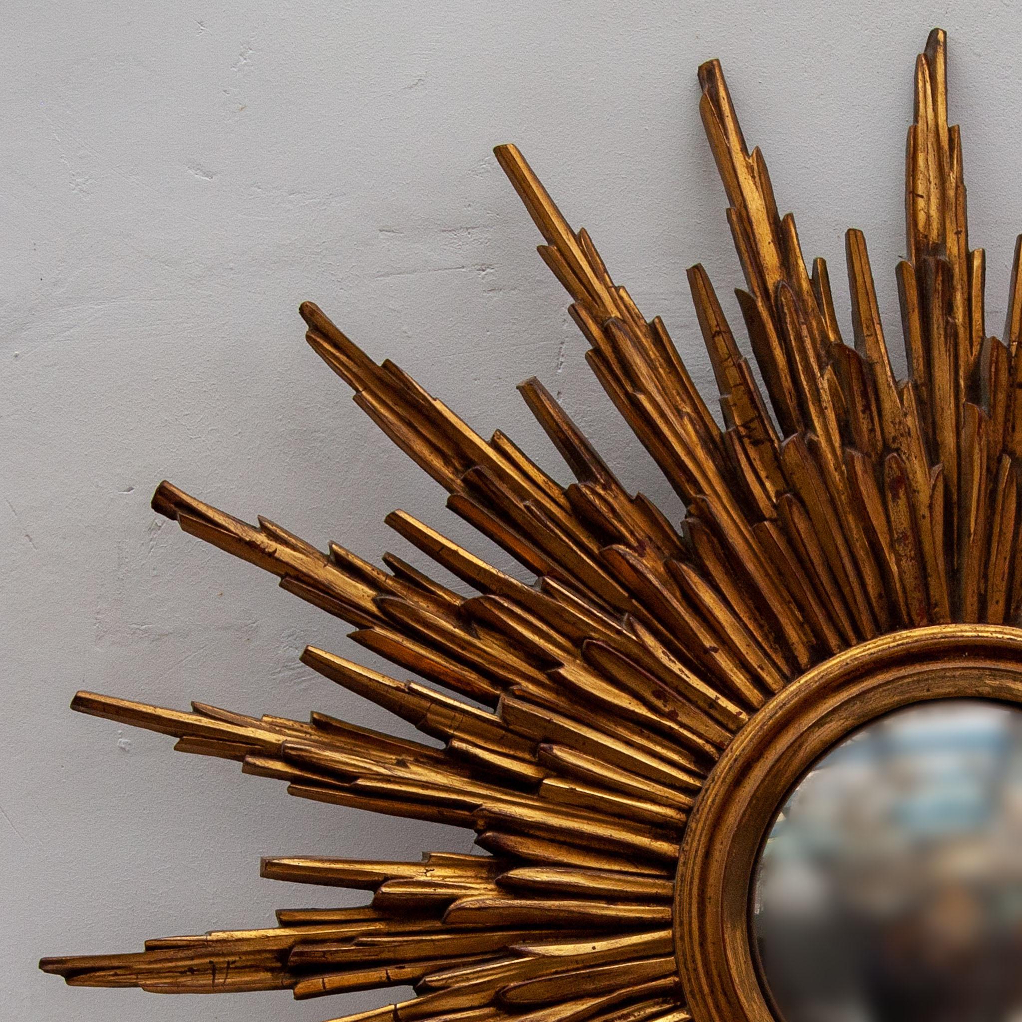 Art Deco Large Sunburst 1930s Wall Mirror Made of Gold-Plated Wood For Sale