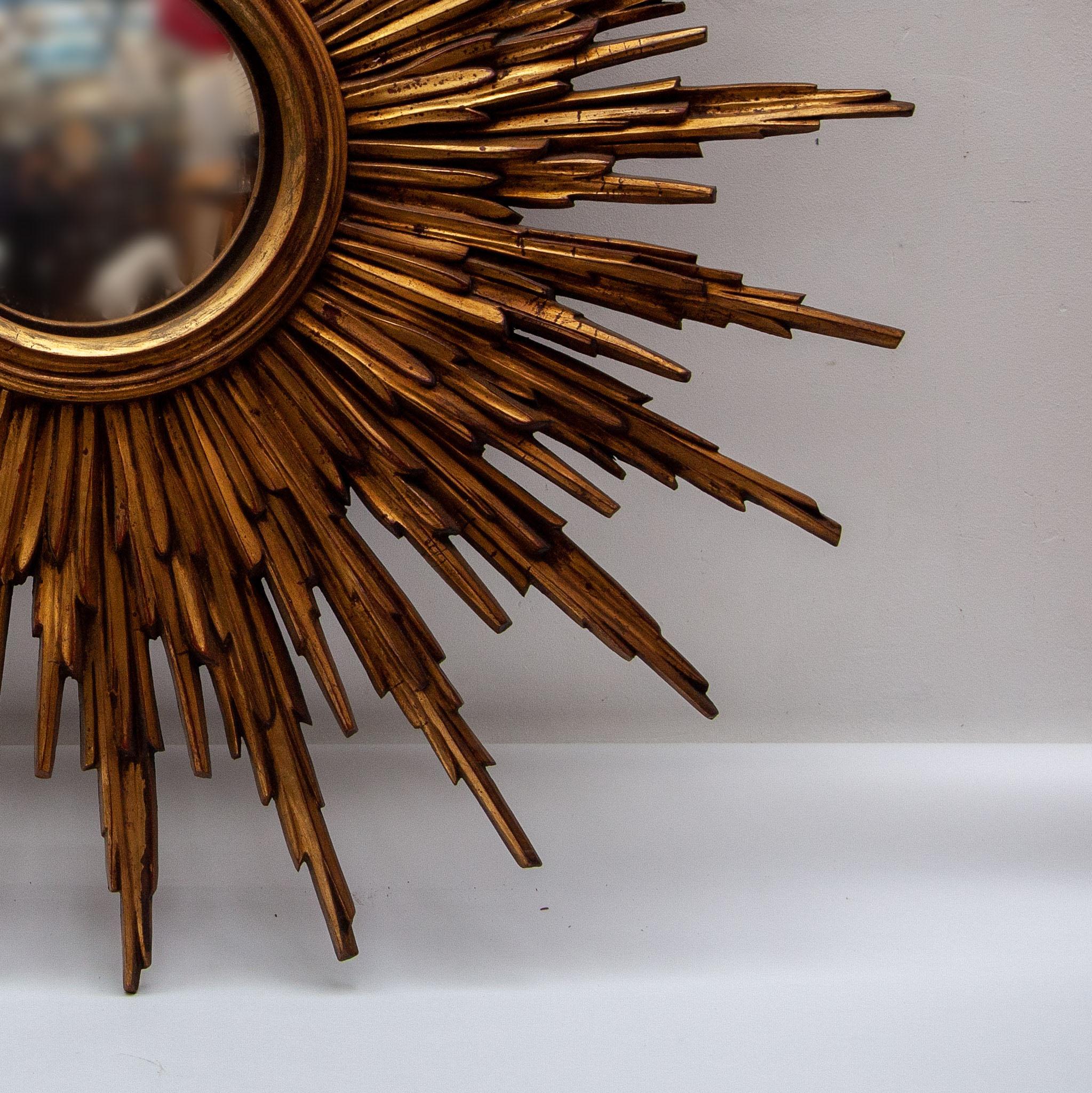 French Large Sunburst 1930s Wall Mirror Made of Gold-Plated Wood For Sale