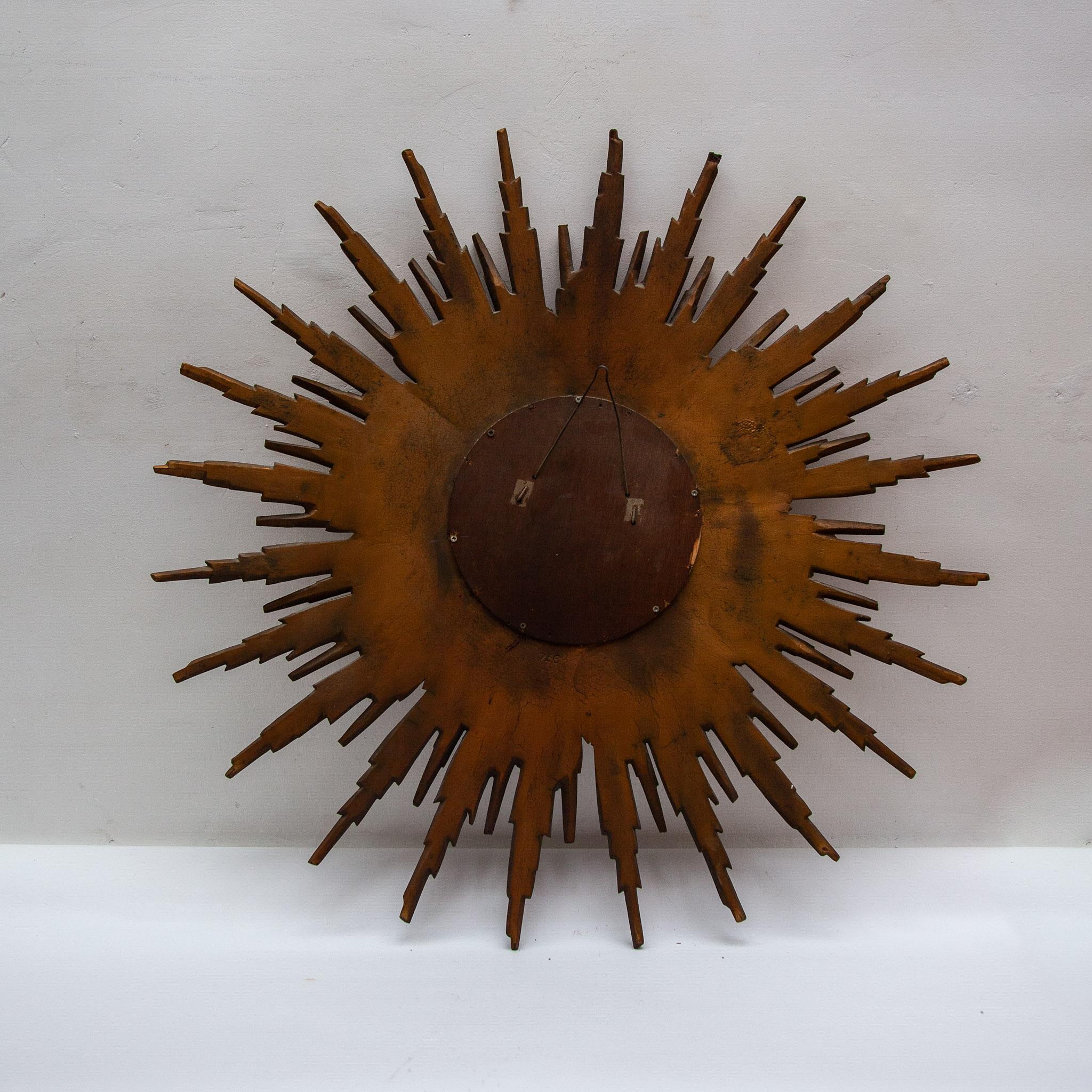 Hand-Crafted Large Sunburst 1930s Wall Mirror Made of Gold-Plated Wood For Sale