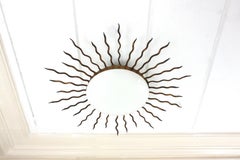 Large Sunburst Ceiling Light Fixture in Gilt Iron and Milk Glass