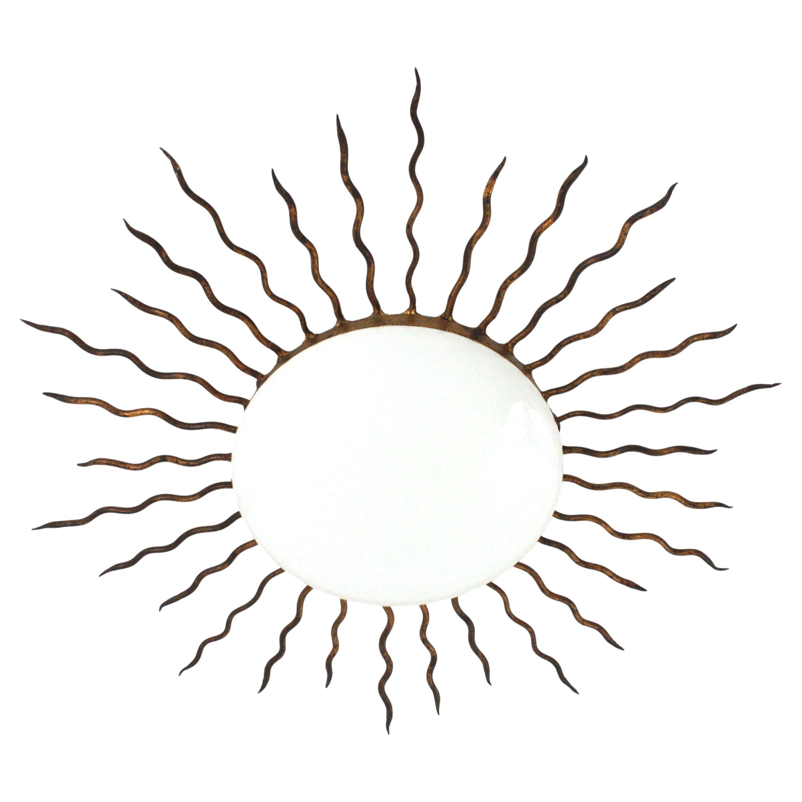 Large Sunburst Ceiling Light Fixture in Gilt Iron and Milk Glass