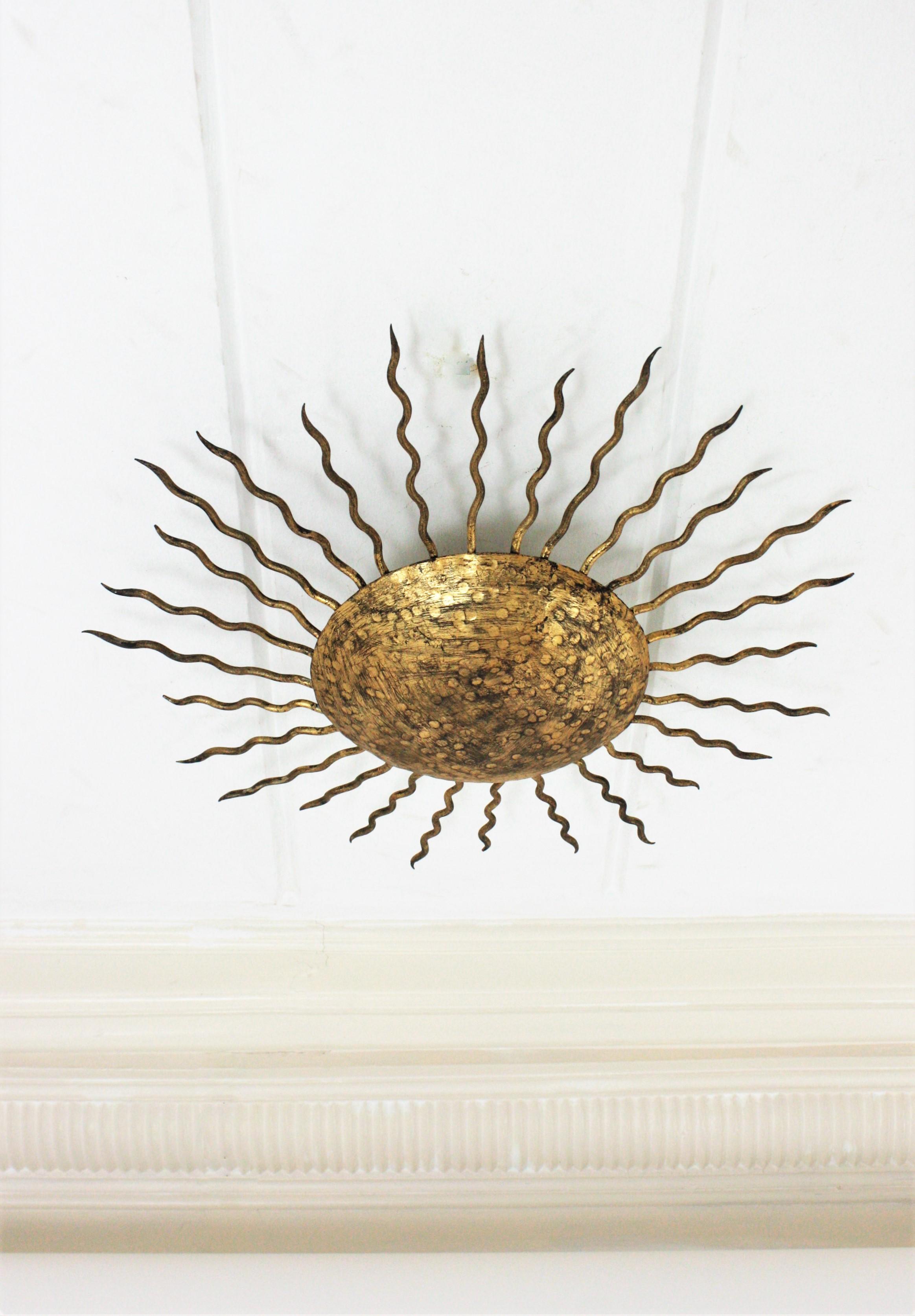 Large Sunburst Ceiling Light Fixture in Hand Hammered Gilt Iron, 1950s For Sale 2