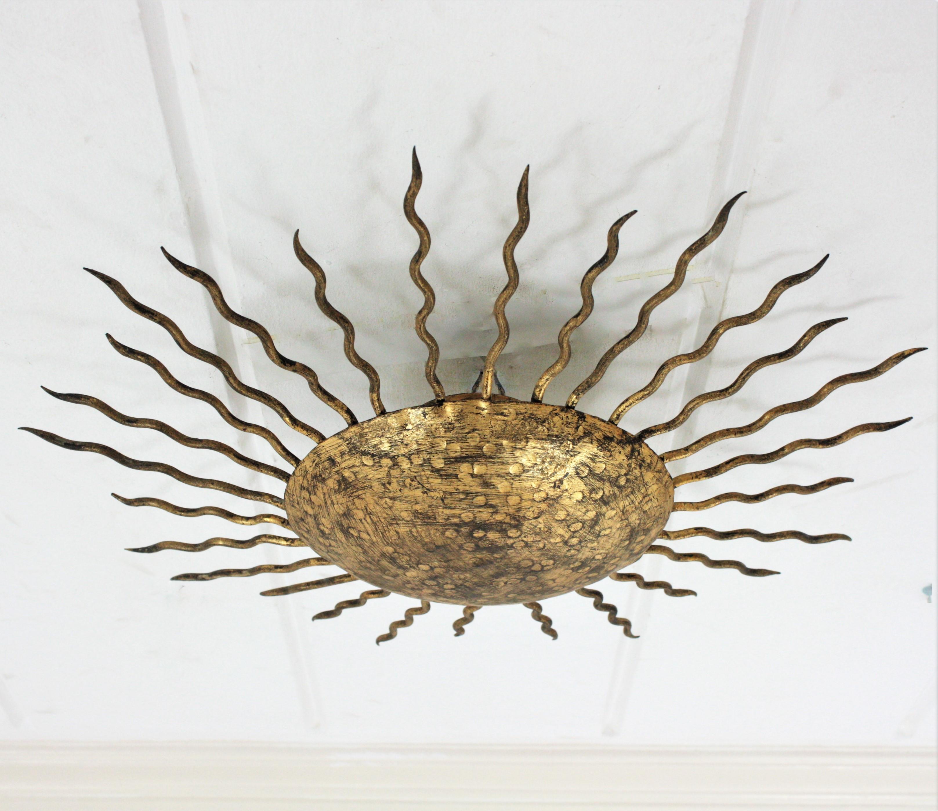 Large Sunburst Ceiling Light Fixture in Hand Hammered Gilt Iron, 1950s For Sale 7
