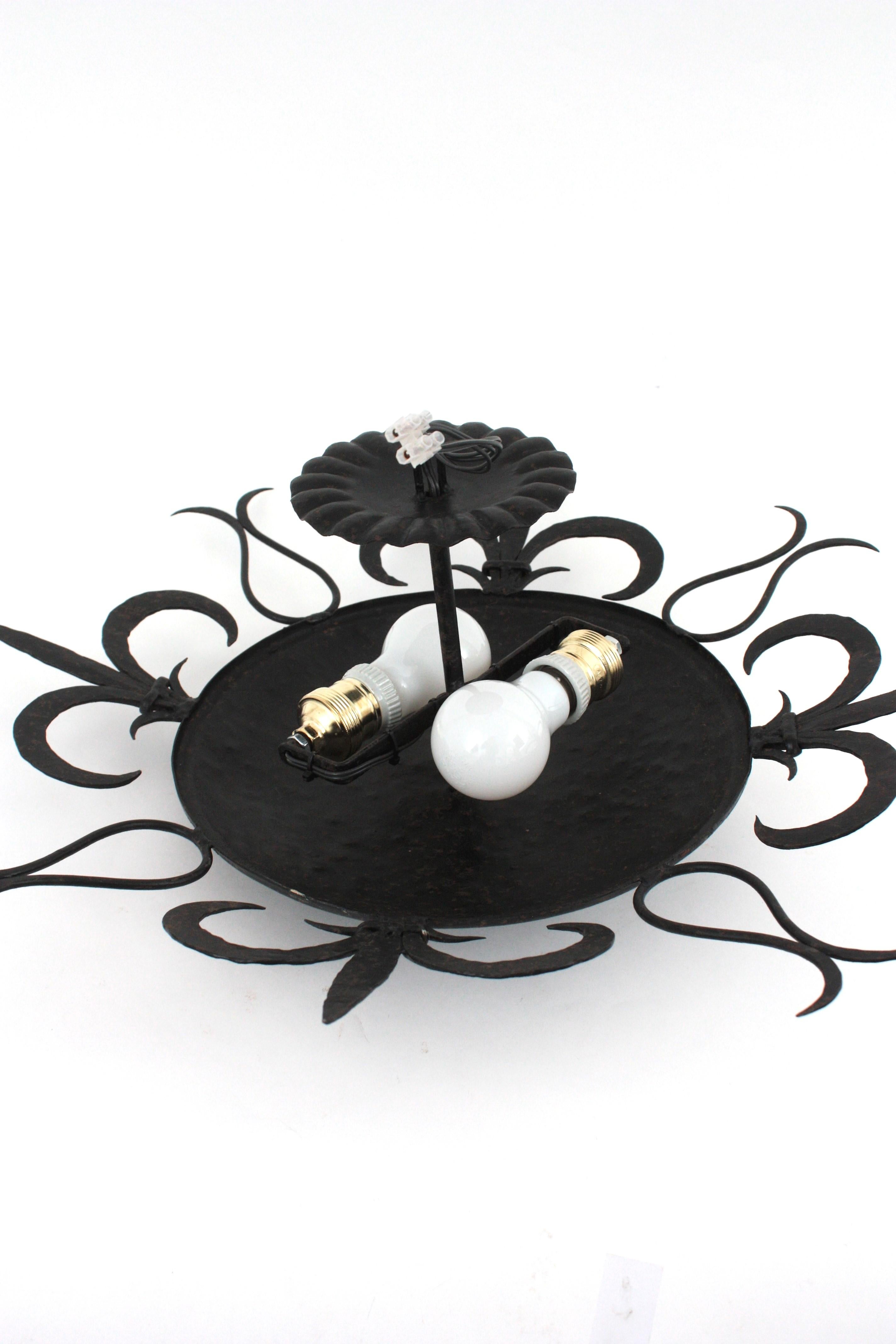 Large Sunburst Ceiling Light Fixture in Wrought Iron, Fleur de Lys Motifs, 1940s For Sale 13