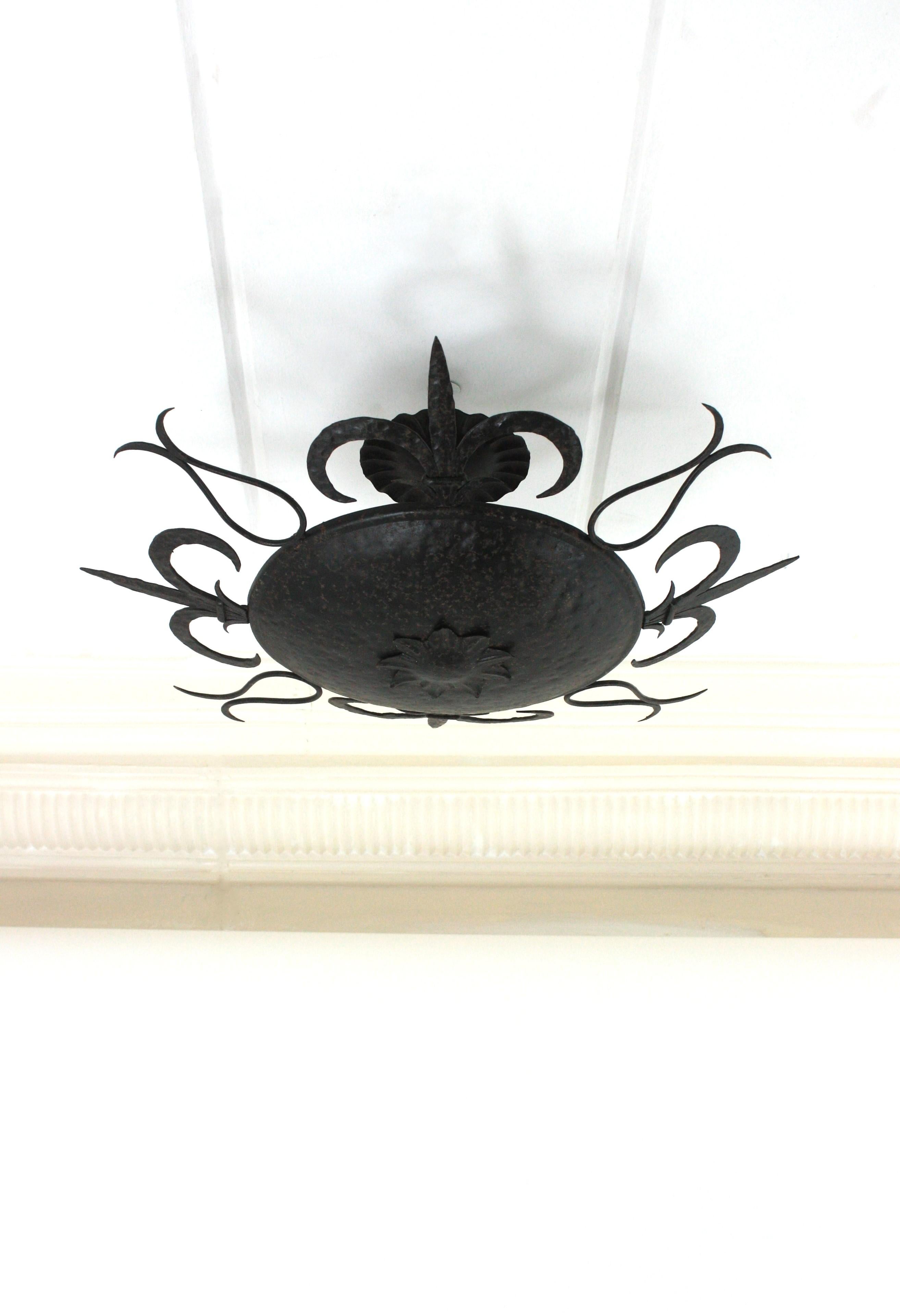Art Deco Large Sunburst Ceiling Light Fixture in Wrought Iron, Fleur de Lys Motifs, 1940s For Sale