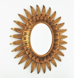 Sunburst Eyelash Spanish Oval Mirror in Gilt Iron