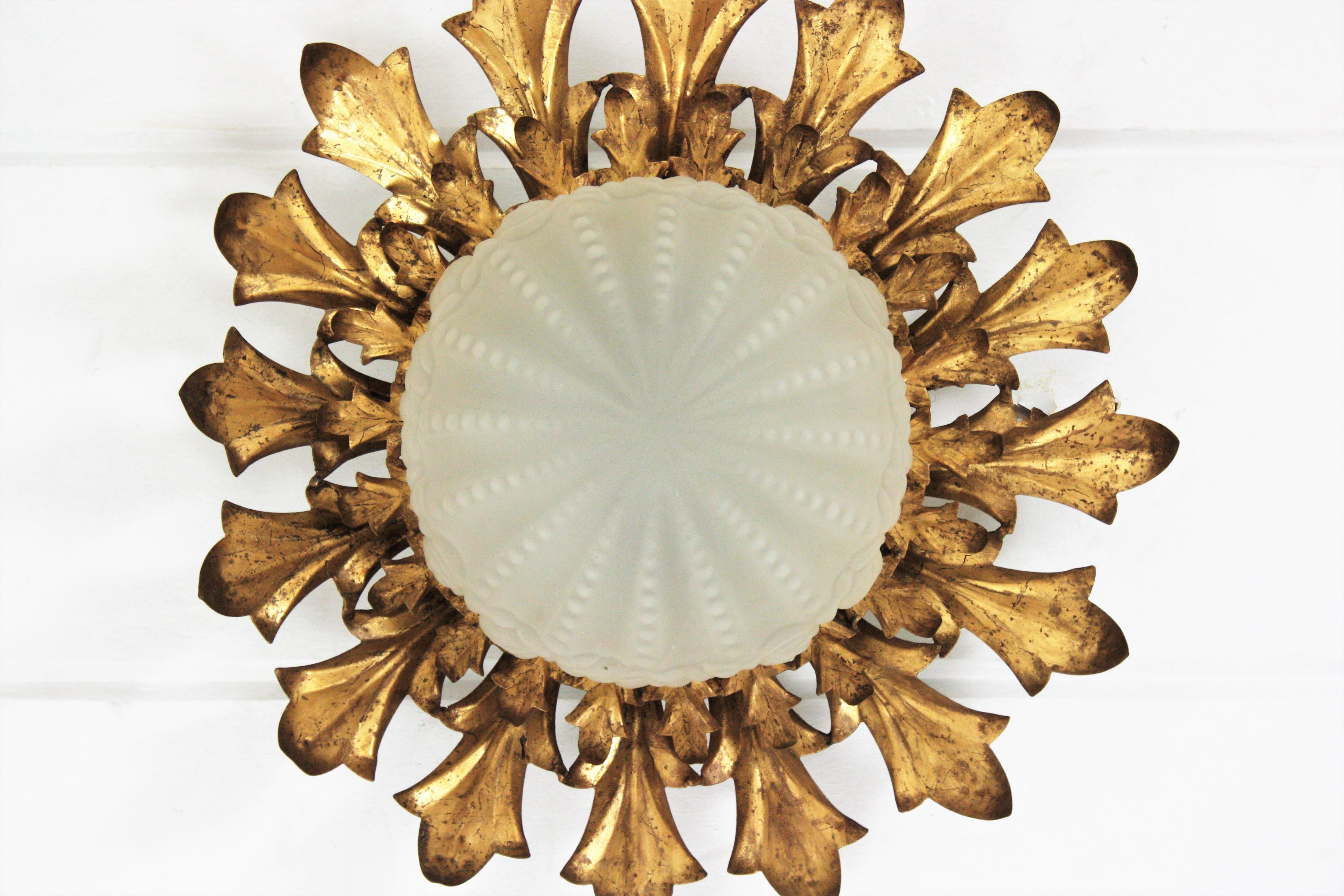 Large Sunburst Flush Mount in Gilt Iron with Frosted Glass Globe For Sale 5