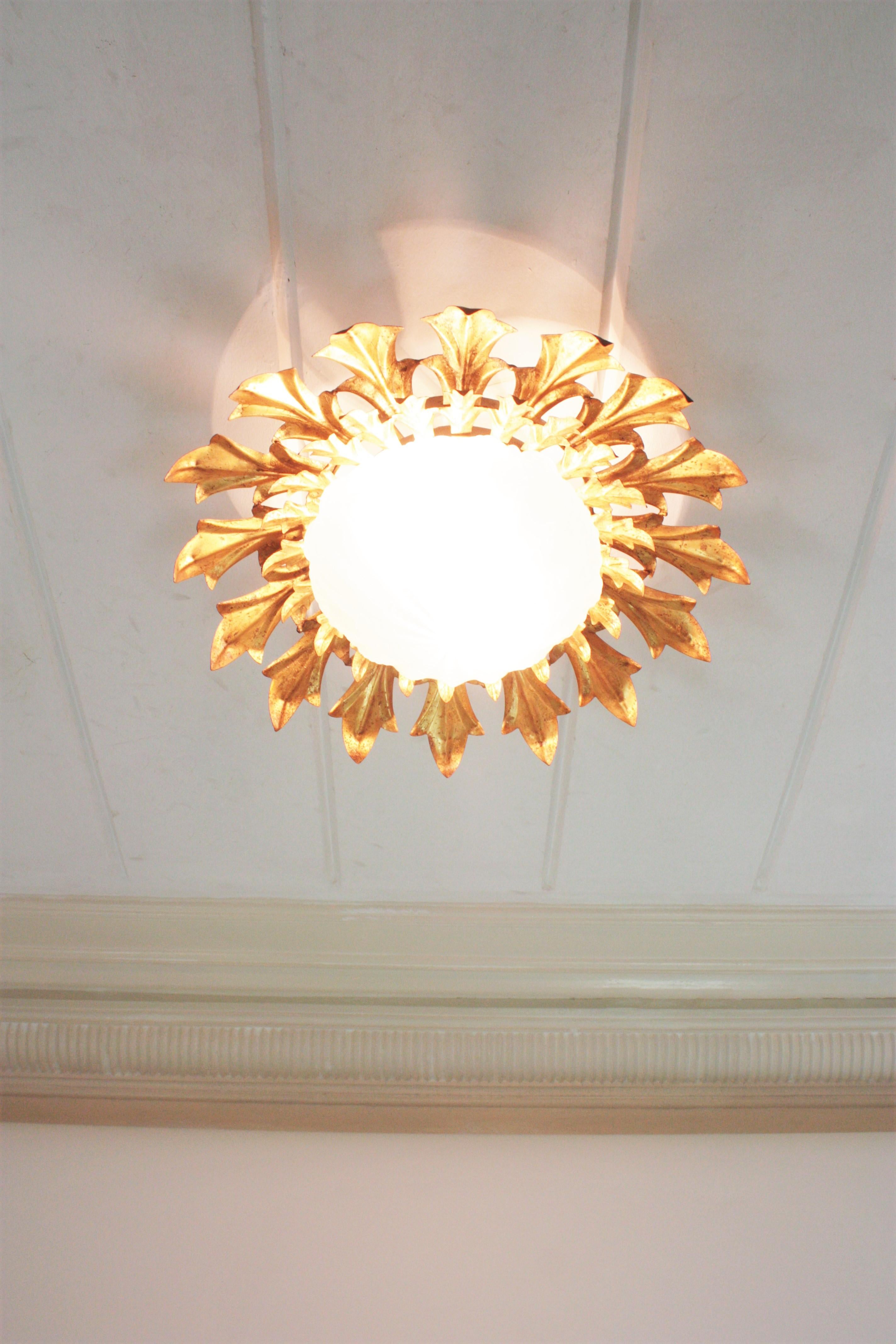 Large Sunburst Flush Mount in Gilt Iron with Frosted Glass Globe For Sale 5