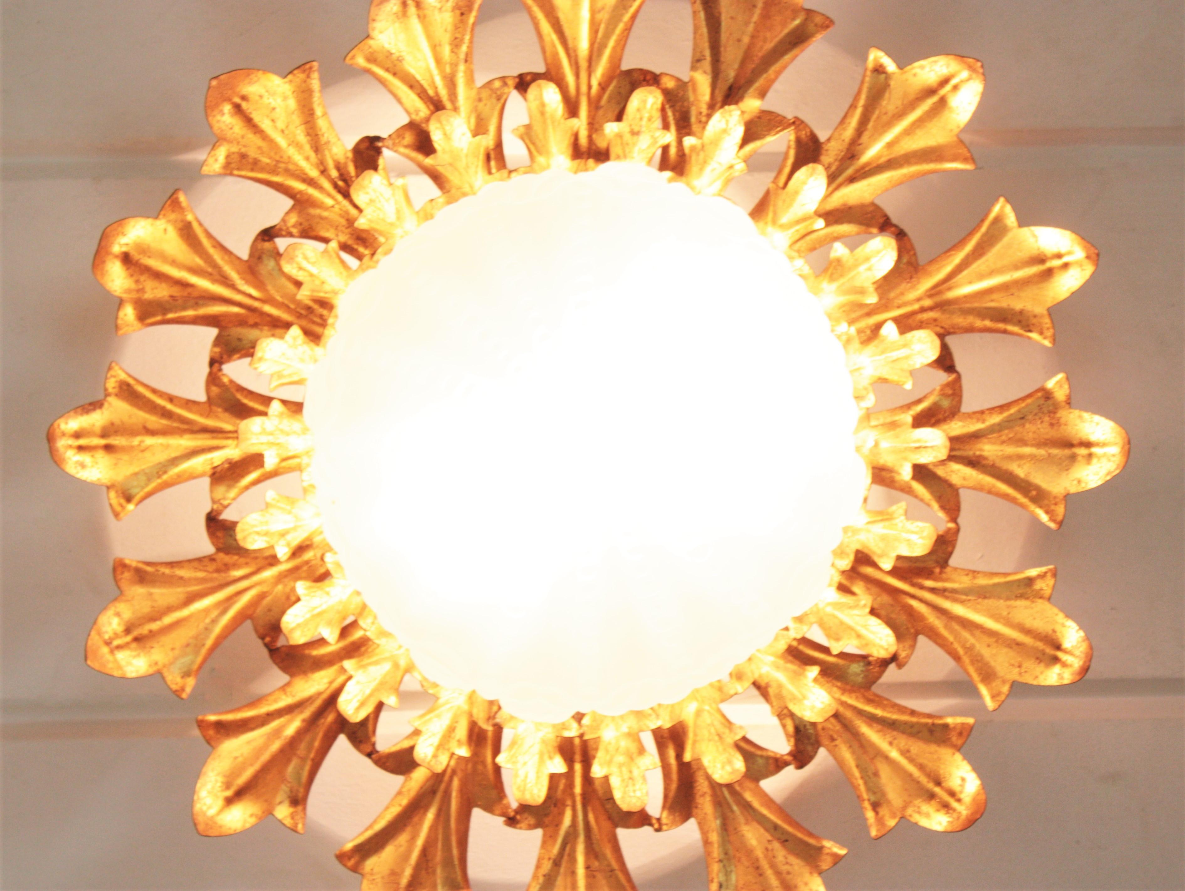Large Sunburst Flush Mount in Gilt Iron with Frosted Glass Globe For Sale 7