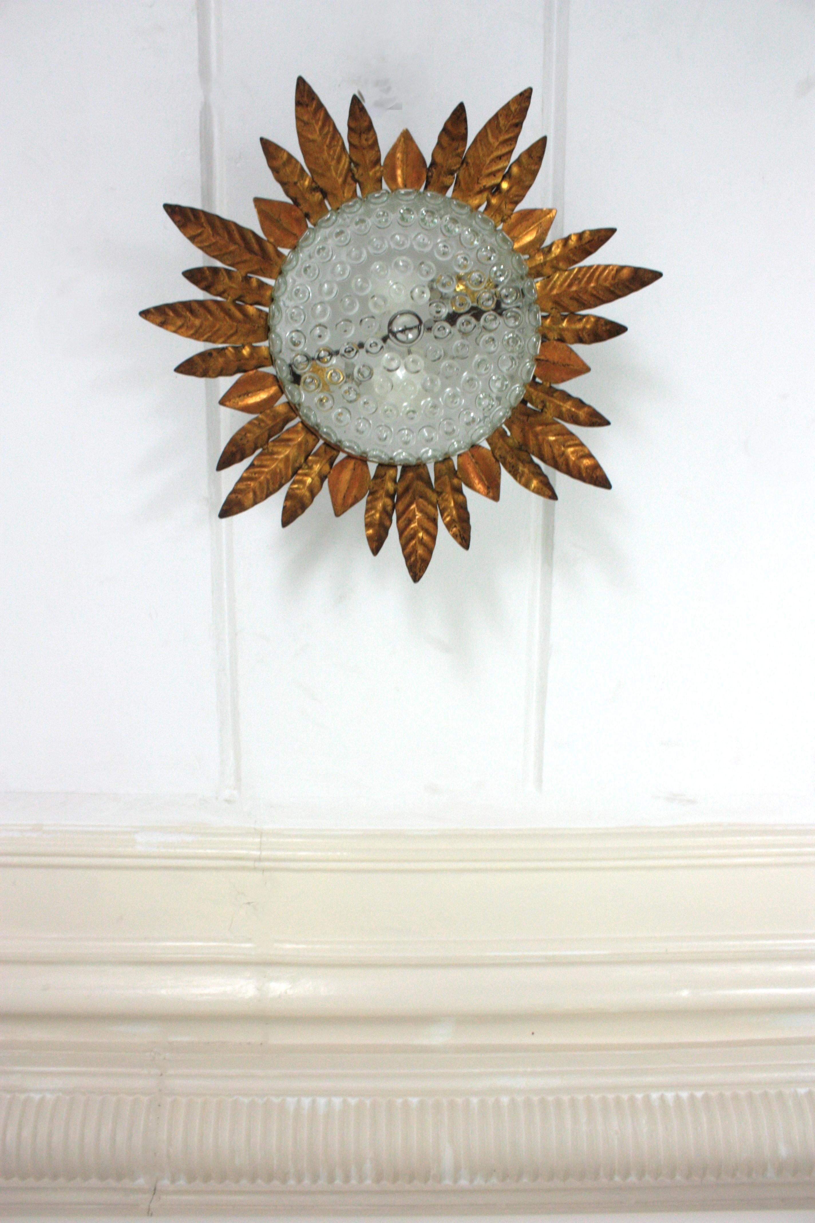 Large Sunburst Leafed Ceiling Light Fixture in Gilt Iron and Pressed Glass For Sale 4