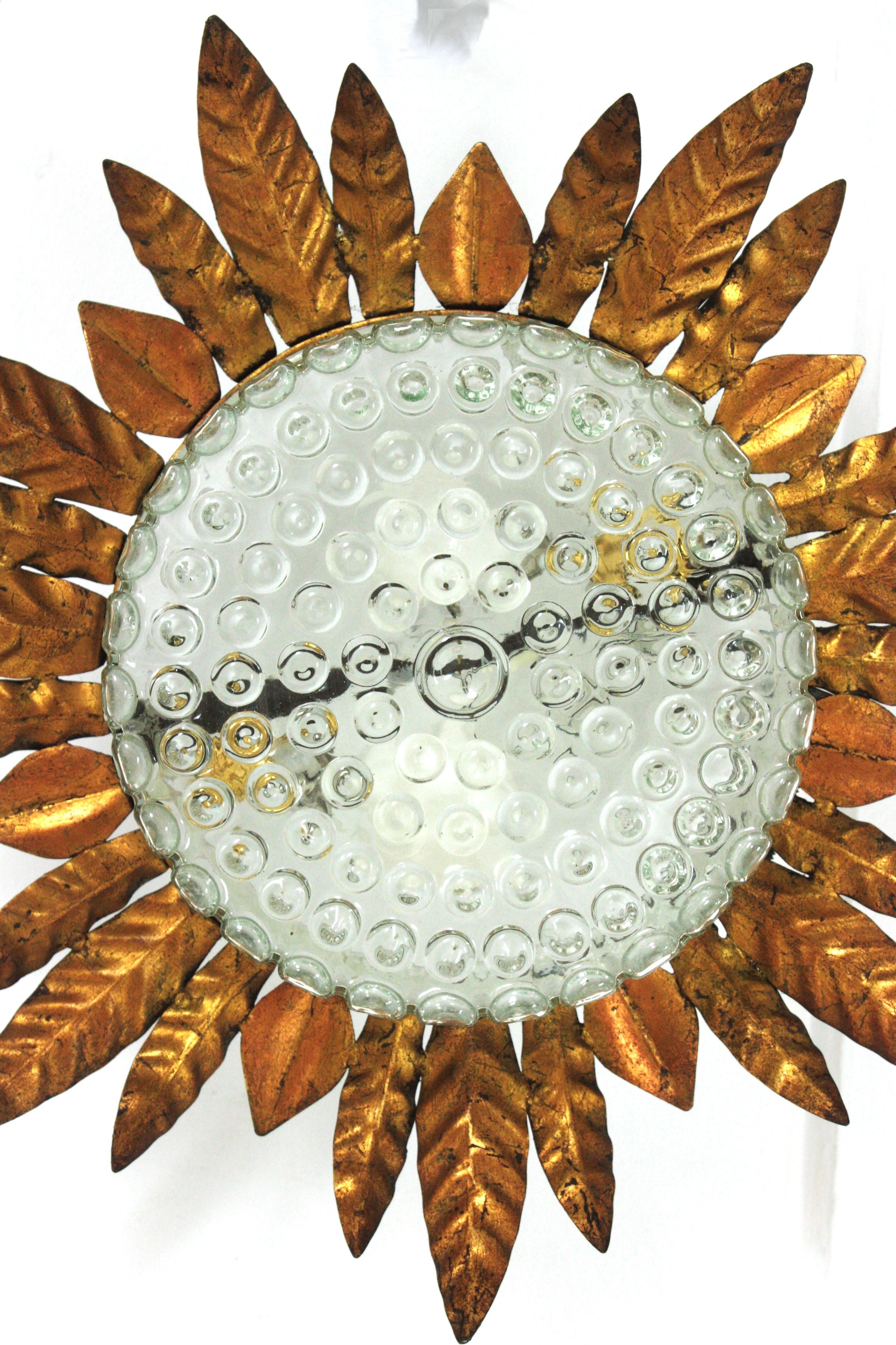 Large Sunburst Leafed Ceiling Light Fixture in Gilt Iron and Pressed Glass For Sale 7