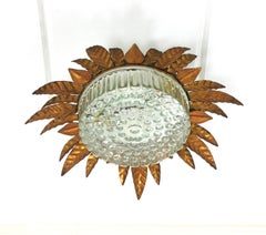 Large Sunburst Leafed Ceiling Light Fixture in Gilt Iron and Pressed Glass