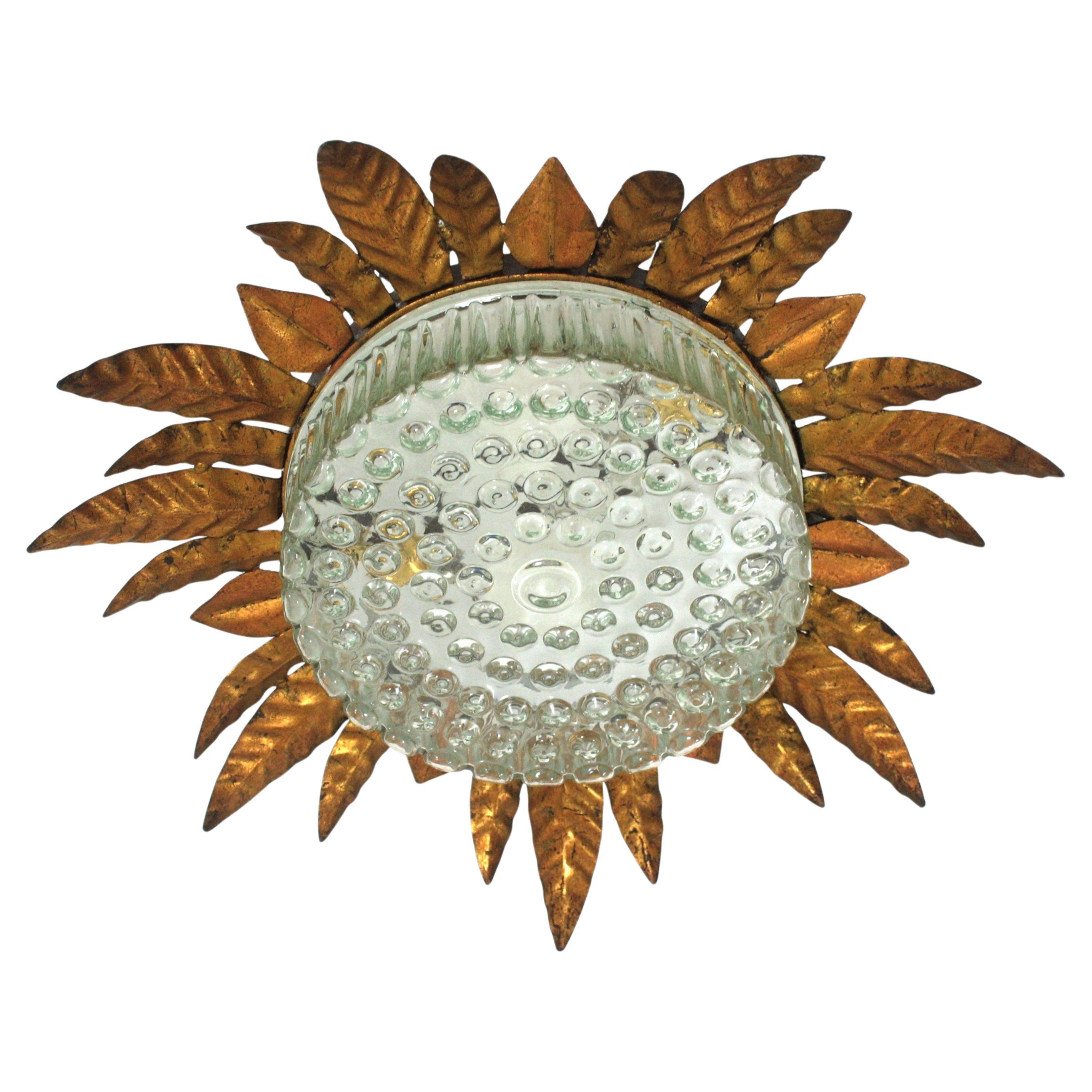 Large Sunburst Leafed Ceiling Light Fixture in Gilt Iron and Pressed Glass