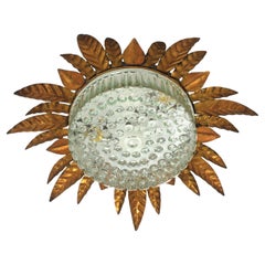 Large Sunburst Leafed Ceiling Light Fixture in Gilt Iron and Pressed Glass