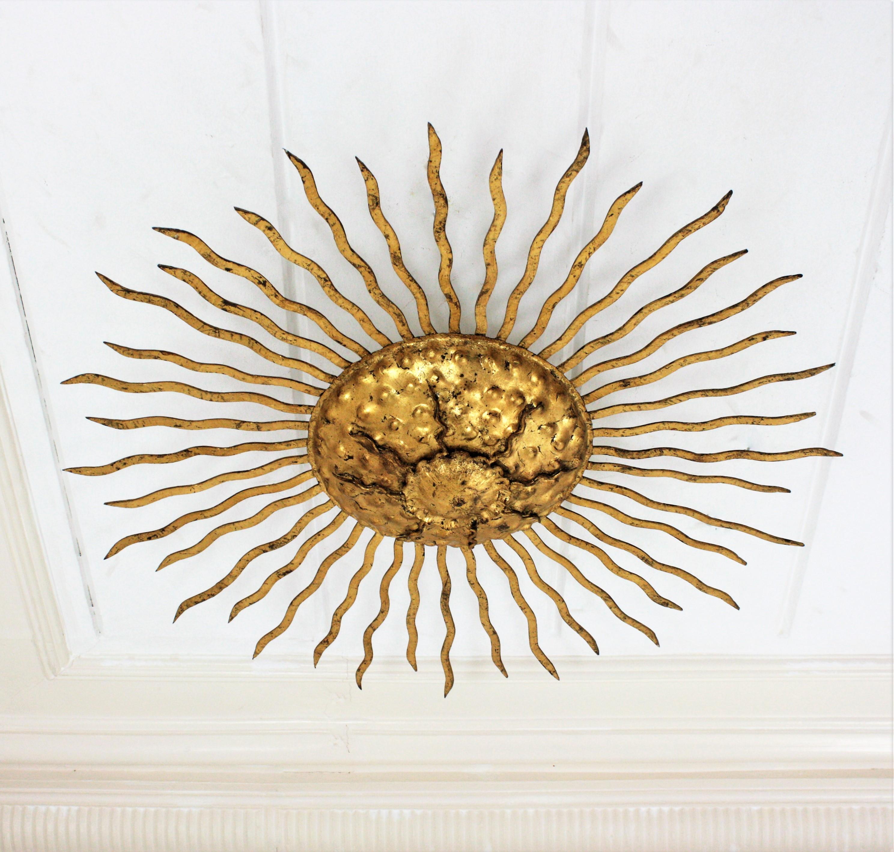 Large Sunburst Light Fixture / Flush Mount in Gilt Wrought Iron, 1950s In Good Condition In Barcelona, ES