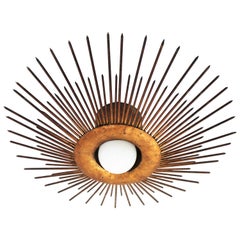 Large Sunburst Light Fixture in Gold Leaf Gilt Iron, France, 1940s