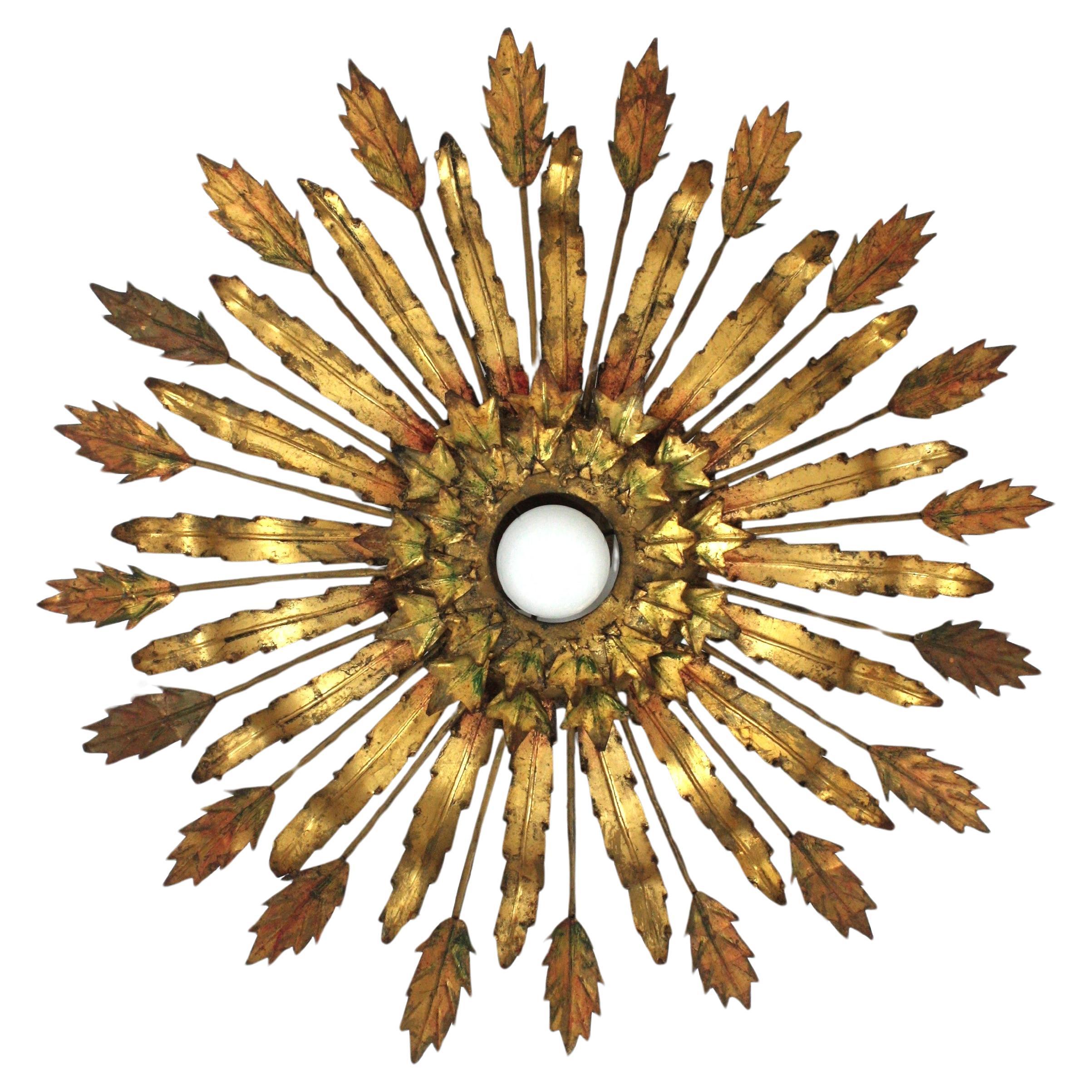 Grand luminaire en forme de soleil avec am designs/One en fer doré, 1950