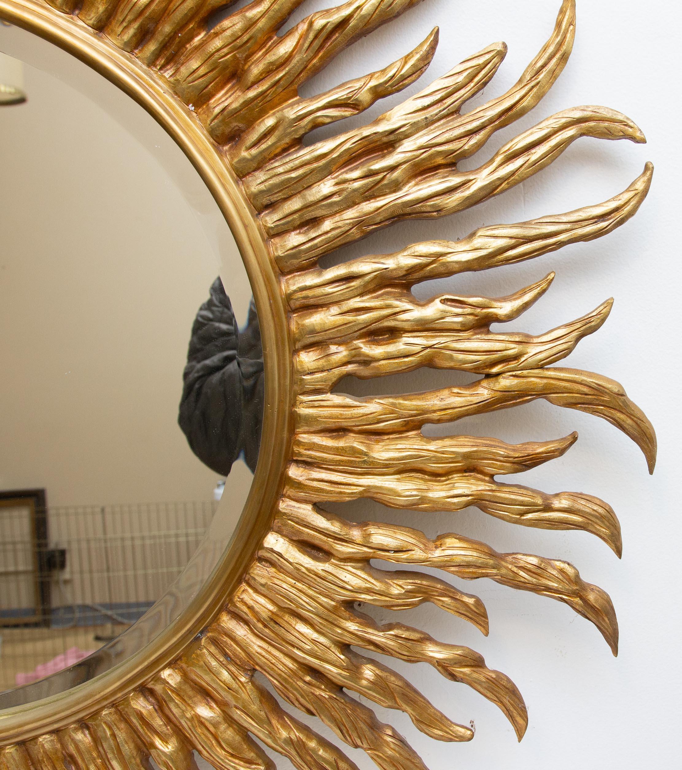 Modern sunburst mirror. Solid cast bonze. Highest quality. Beveled glass mirror. Measure: 40